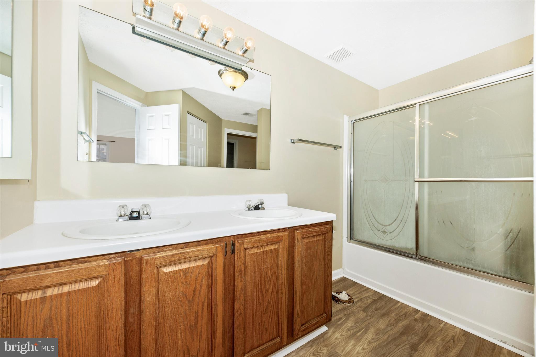 813 Stratford Way, Unit J Frederick, MD 21701 - Photo 18 of 25 Hall bath with dual vanities (toilet will added)