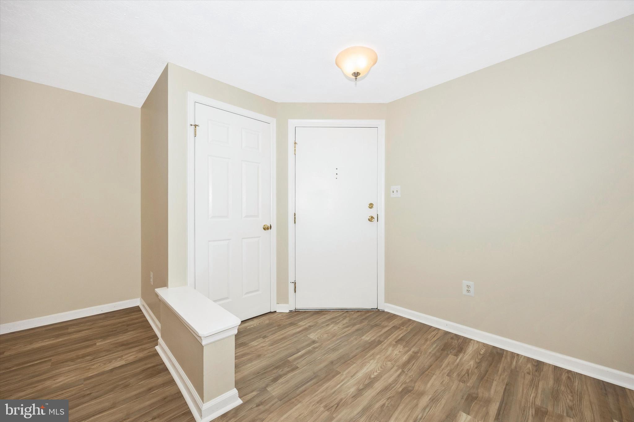 813 Stratford Way, Unit J Frederick, MD 21701 - Photo 4 of 25 Foyer with generous coat closet