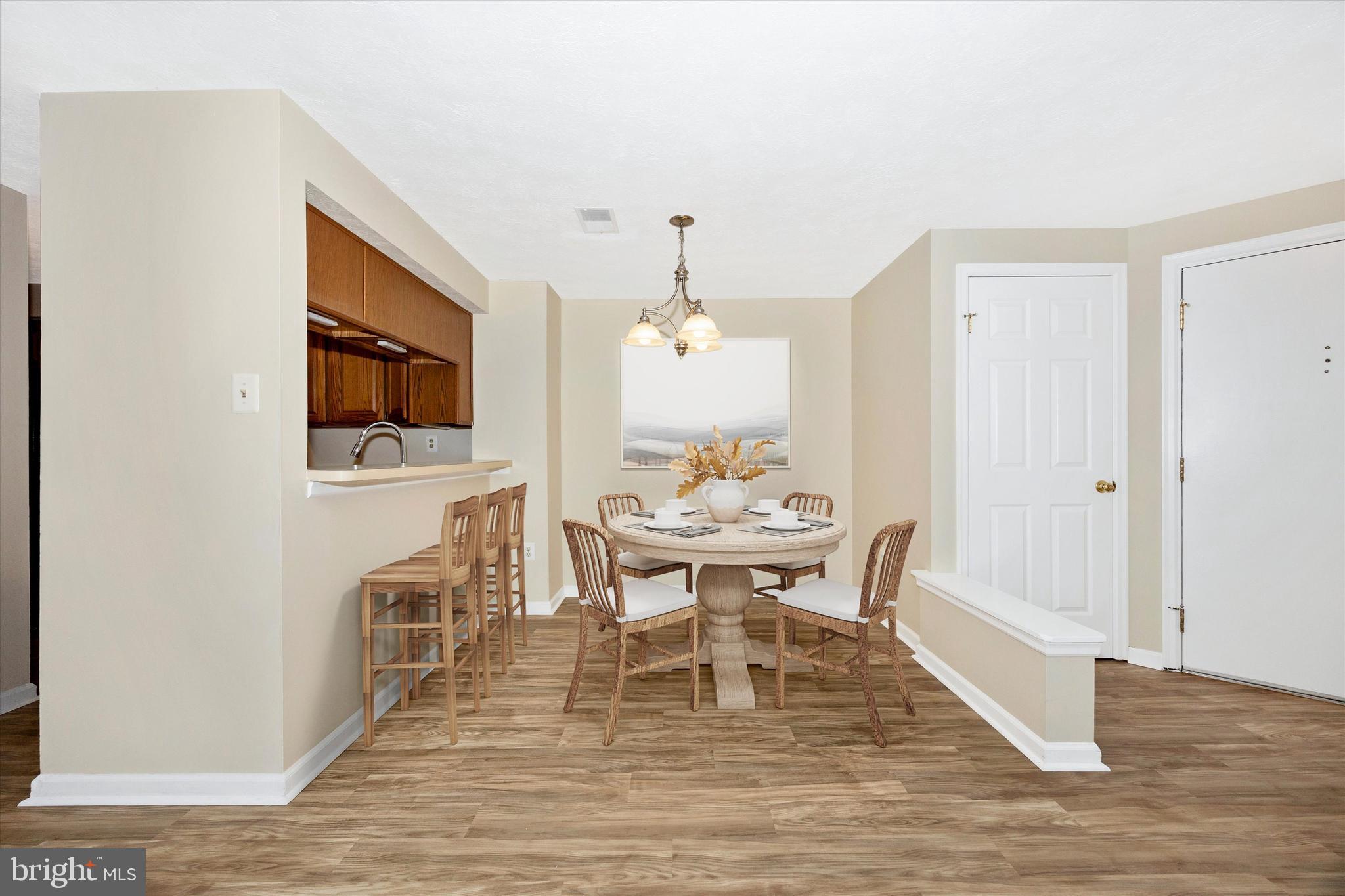 813 Stratford Way, Unit J Frederick, MD 21701 - Photo 7 of 25 Virtually staged dining room