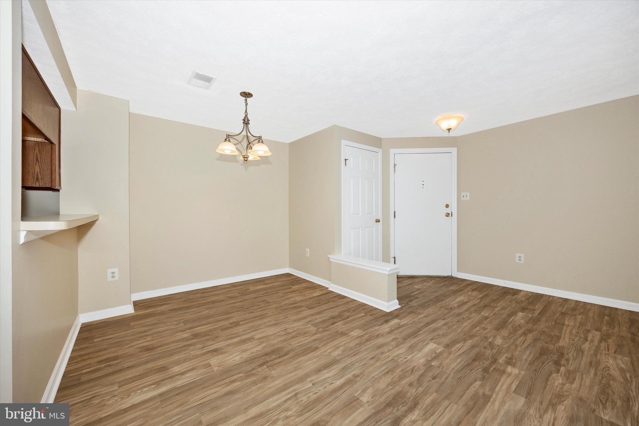 813 Stratford Way, Unit J Frederick, MD 21701 - Photo 8 of 25 Dining room, note all new LVP