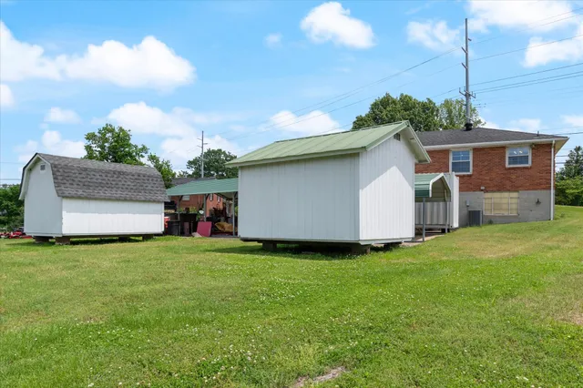 a view of a backyard of the house