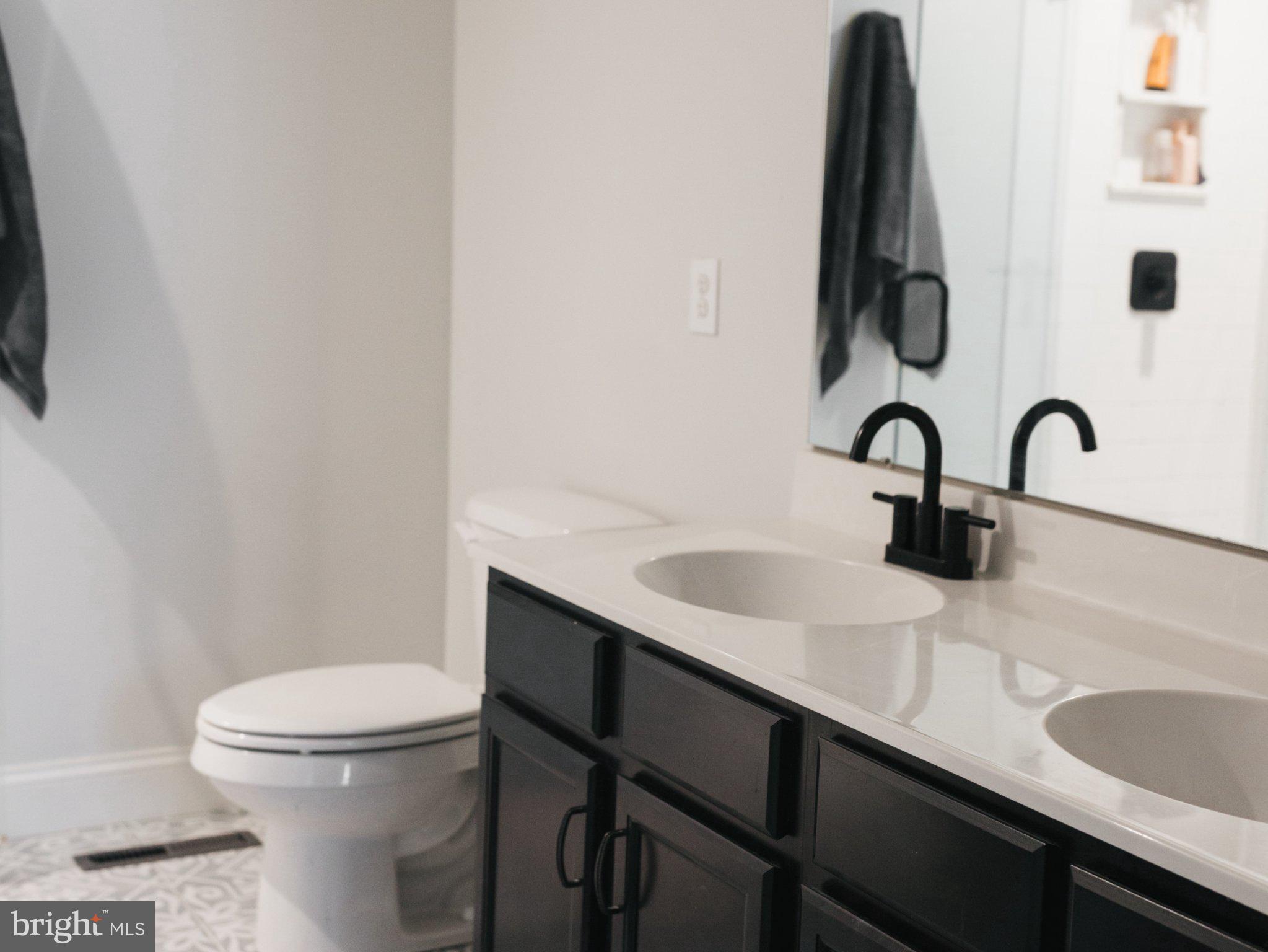 3784 William Daves Road Doylestown, PA 18902 - Photo 13 of 30 a bathroom with a sink and a toilet