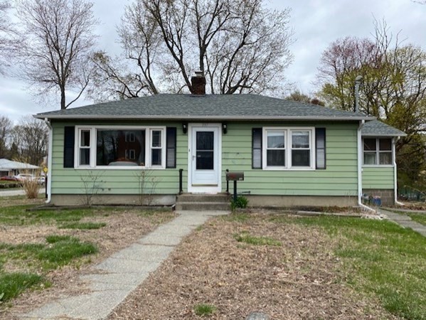 a house that has a window in front of a house
