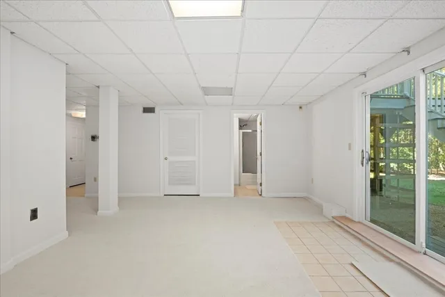 an empty room with windows