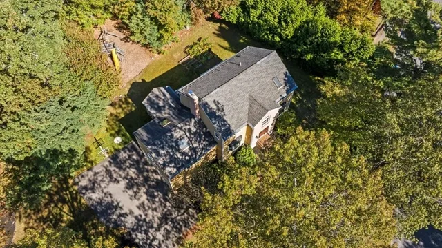 a front view of a house with swimming pool