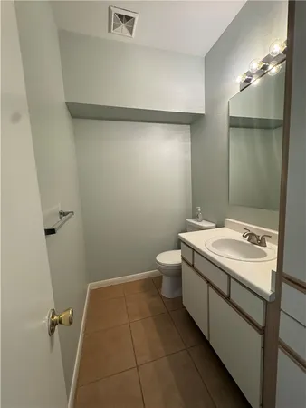 a room with a large window and flat screen tv