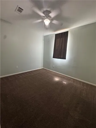 a bathroom with a double vanity sink a mirror and a shower
