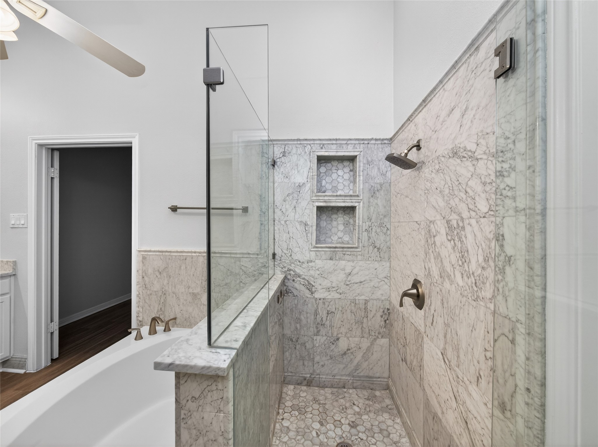 11029 Ballybunion Place Austin, TX 78747 - Photo 21 of 40 a bathroom with a shower and a sink