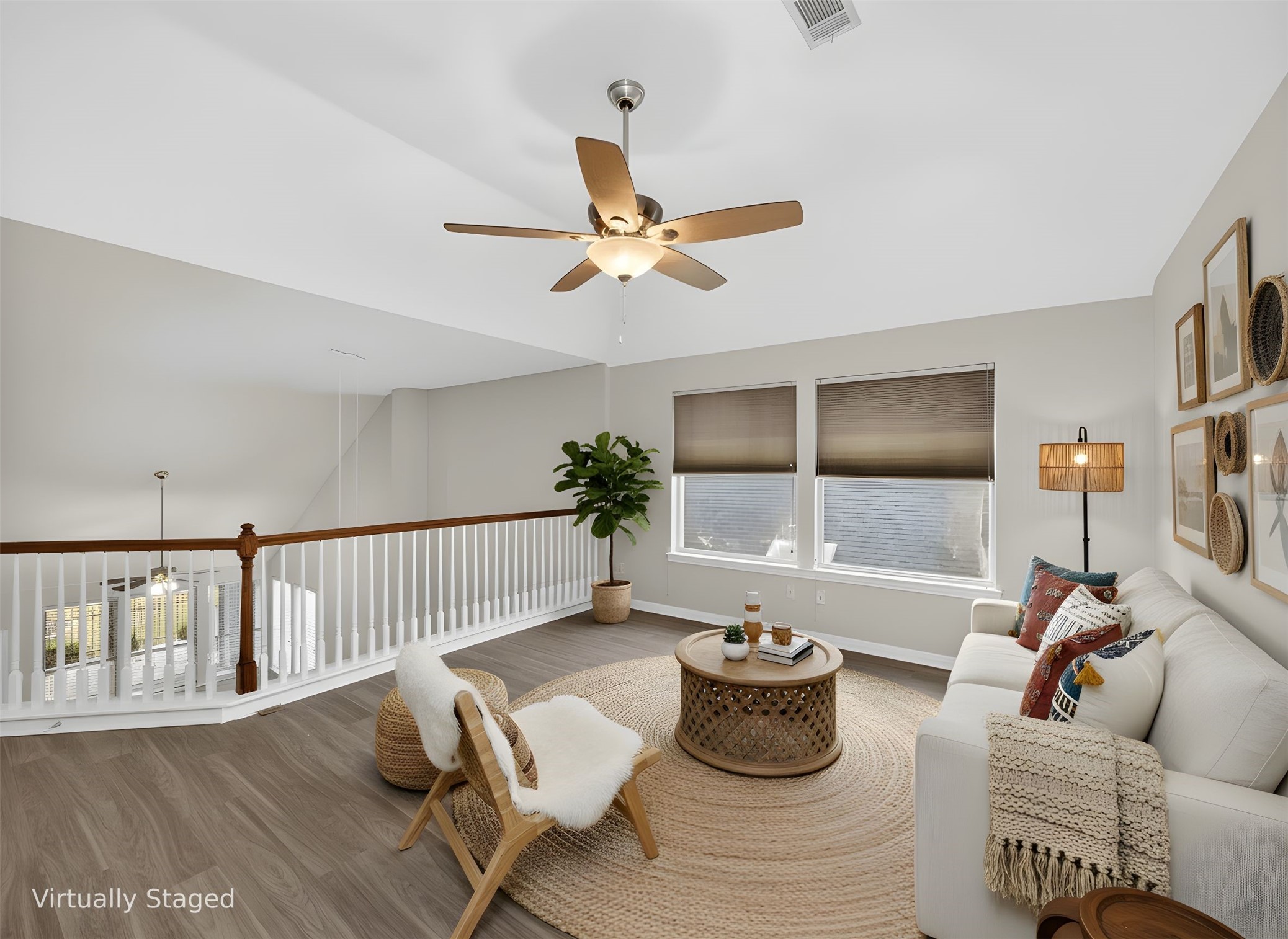 11029 Ballybunion Place Austin, TX 78747 - Photo 26 of 40 a living room with furniture and a large window