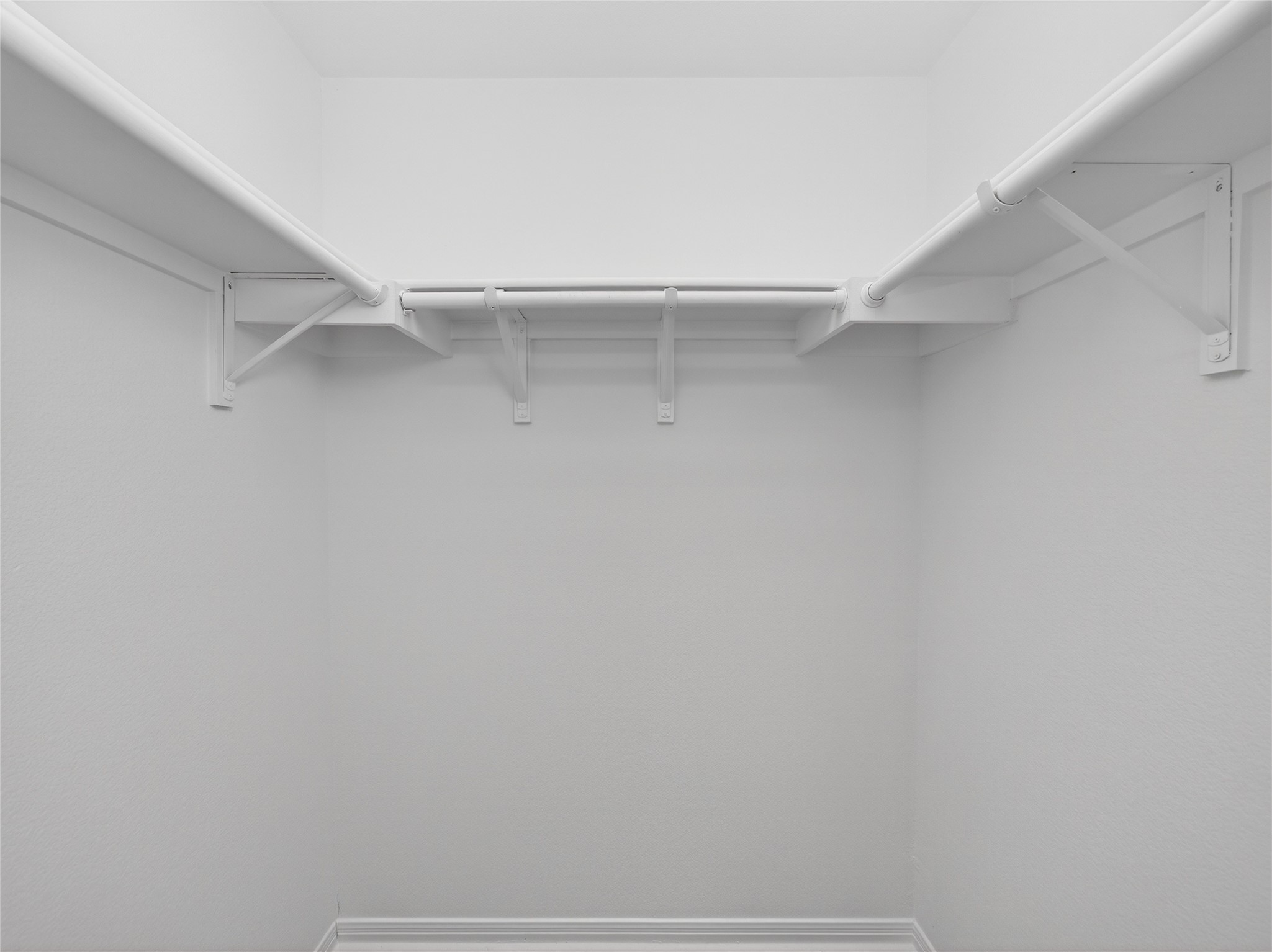 11029 Ballybunion Place Austin, TX 78747 - Photo 28 of 40 a view of an empty walk in closet