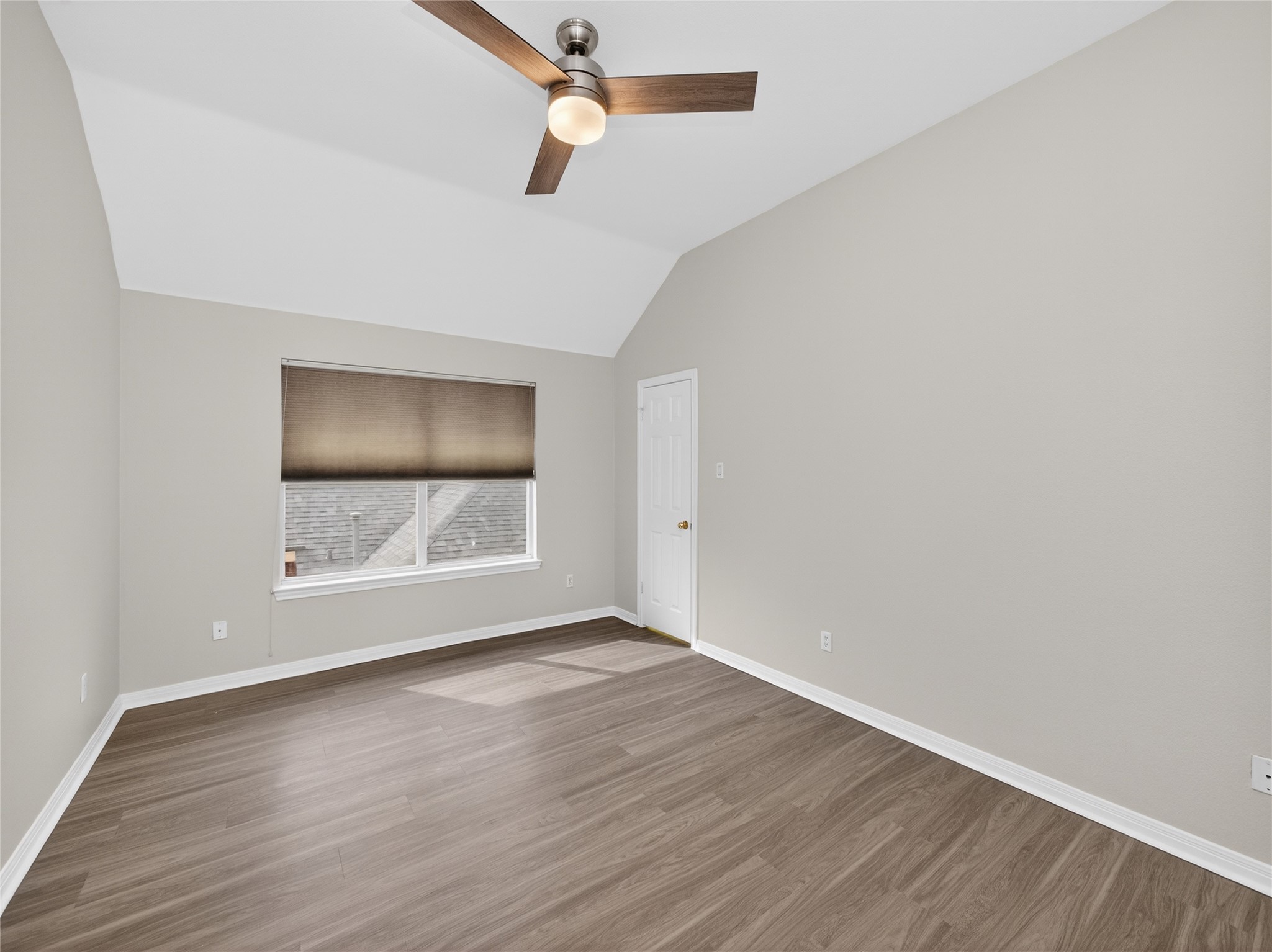 11029 Ballybunion Place Austin, TX 78747 - Photo 29 of 40 an empty room with wooden floor and windows