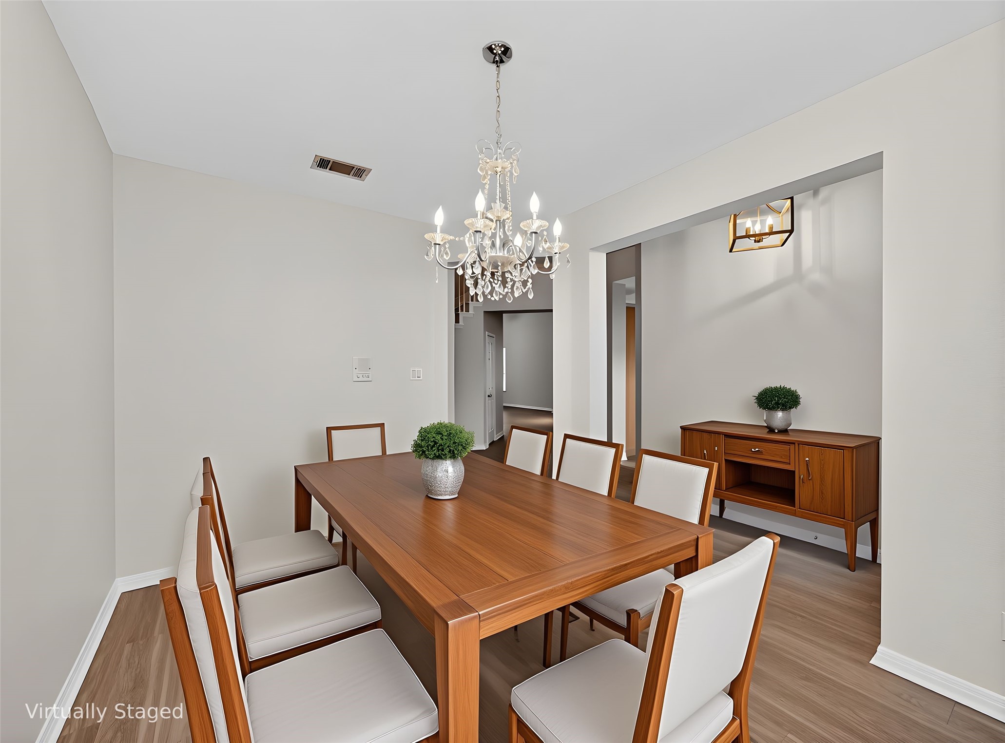 11029 Ballybunion Place Austin, TX 78747 - Photo 4 of 40 a view of a dining room with furniture and wooden floor