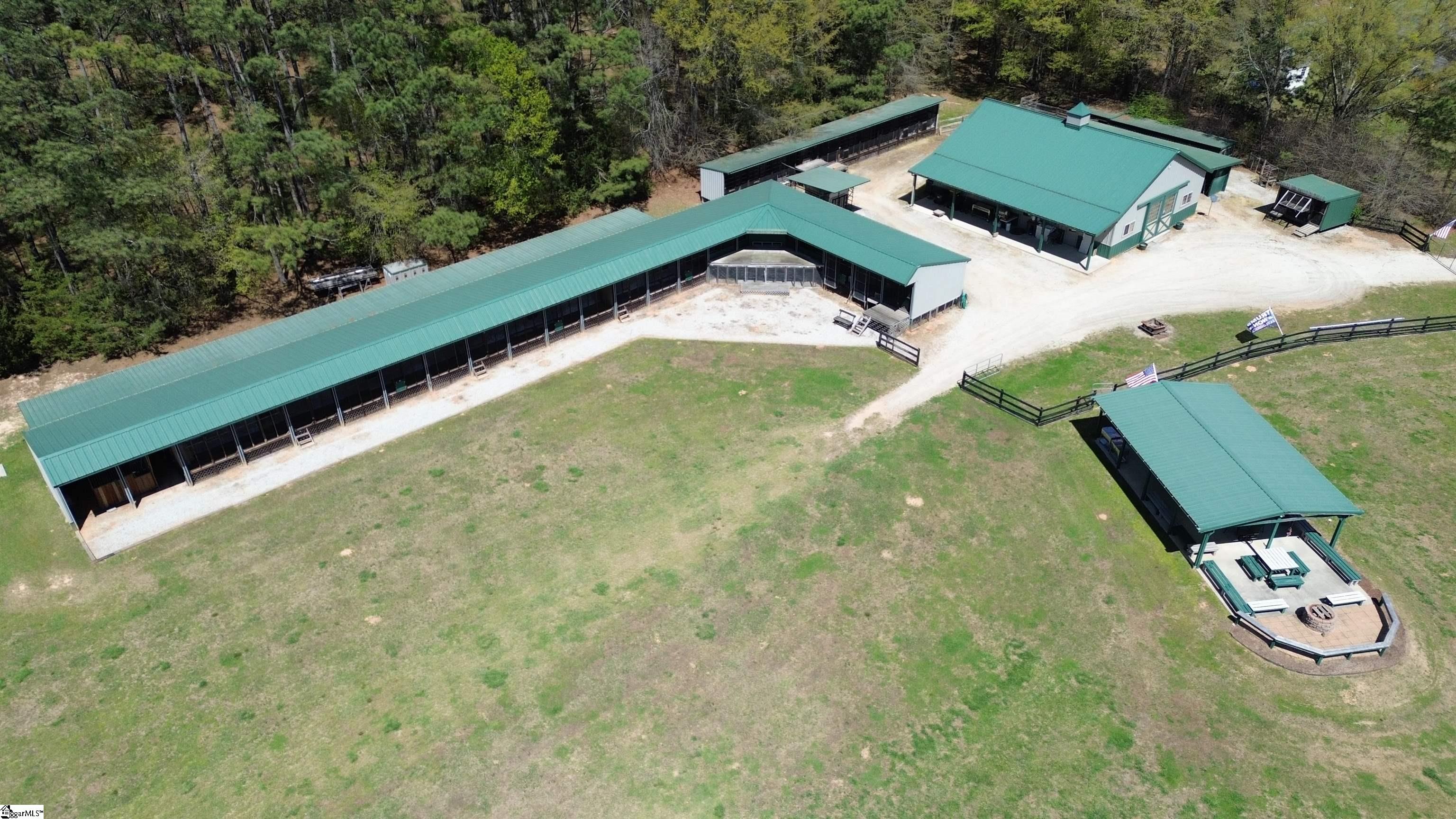 406 Casey Road Woodruff, SC 29388 - Photo 39 of 50 Barn has full workshop PLUS built in office, kitchen, bedroom, full bath and loft space.