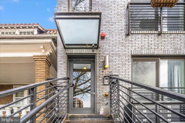 a view of a balcony with a door