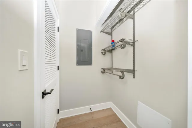 a view of a brick building with many windows