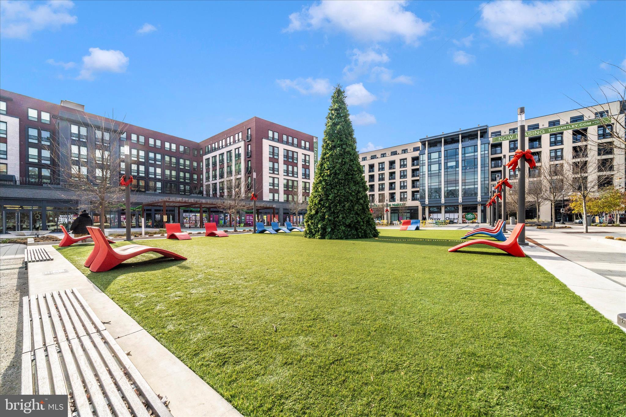 7129 Georgia Avenue Northwest, Unit 4 Washington, DC 20012 - Photo 27 of 30 a view of a swimming pool with an outdoor seating