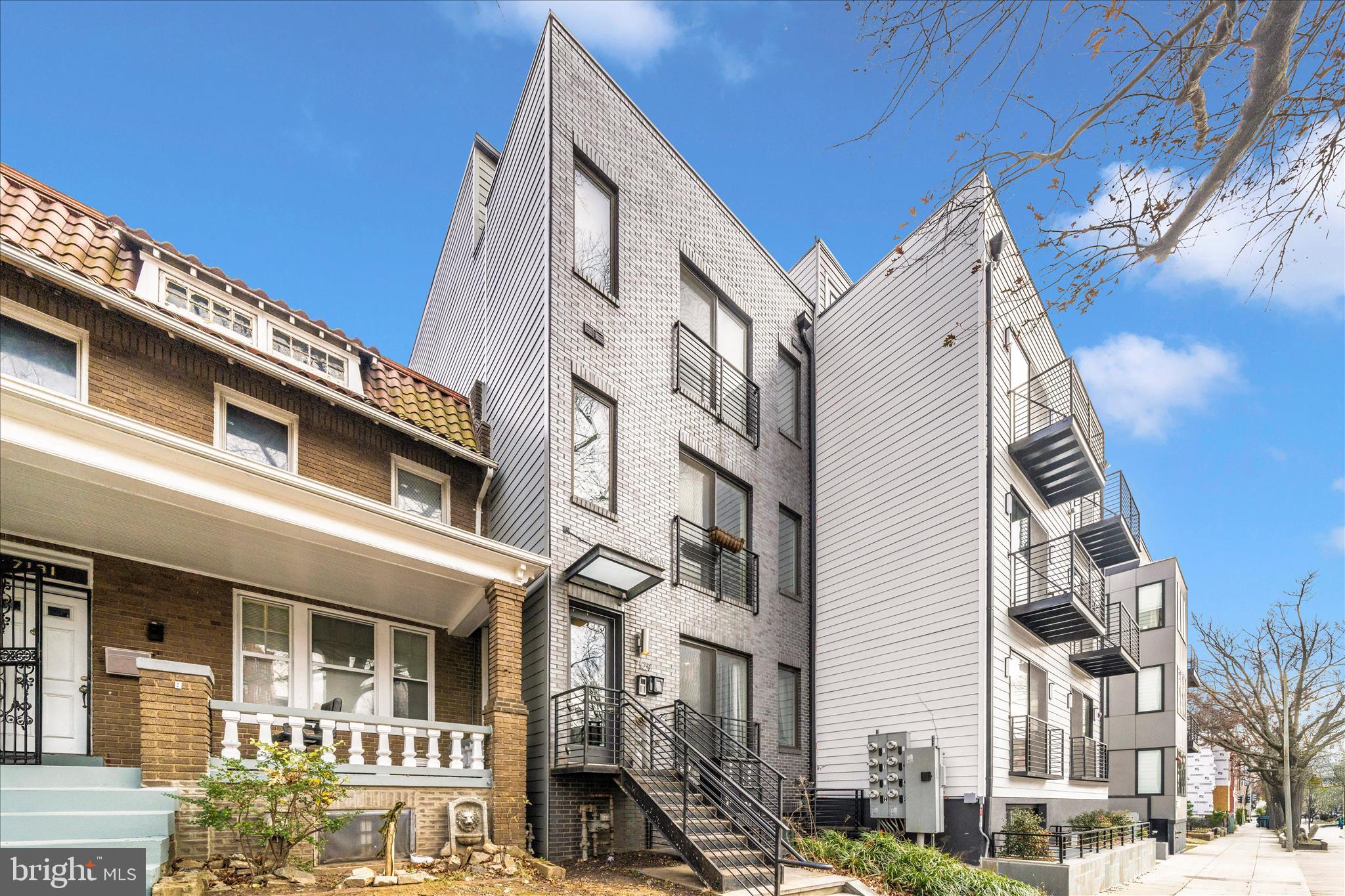 7129 Georgia Avenue Northwest, Unit 4 Washington, DC 20012 - Photo 3 of 30 a view of a building with a street