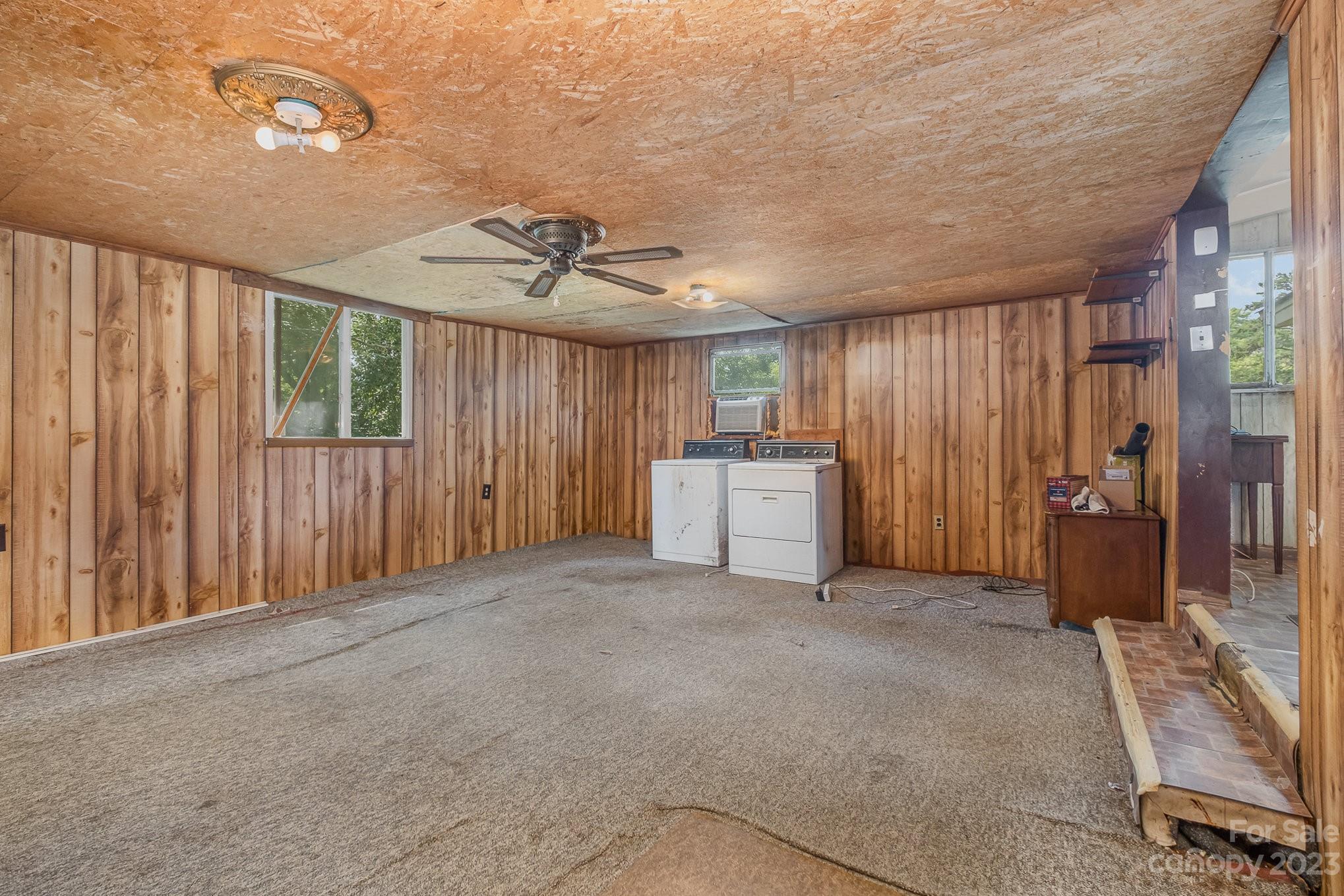 1139 Clanton Road Charlotte, NC 28217 - Photo 13 of 22 a view of an empty room with a window
