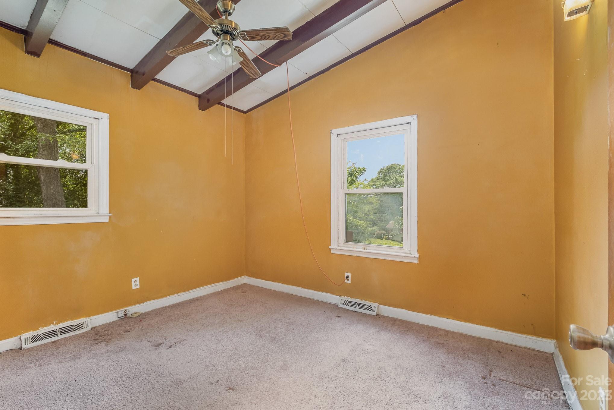 1139 Clanton Road Charlotte, NC 28217 - Photo 16 of 22 a view of an empty room with a window