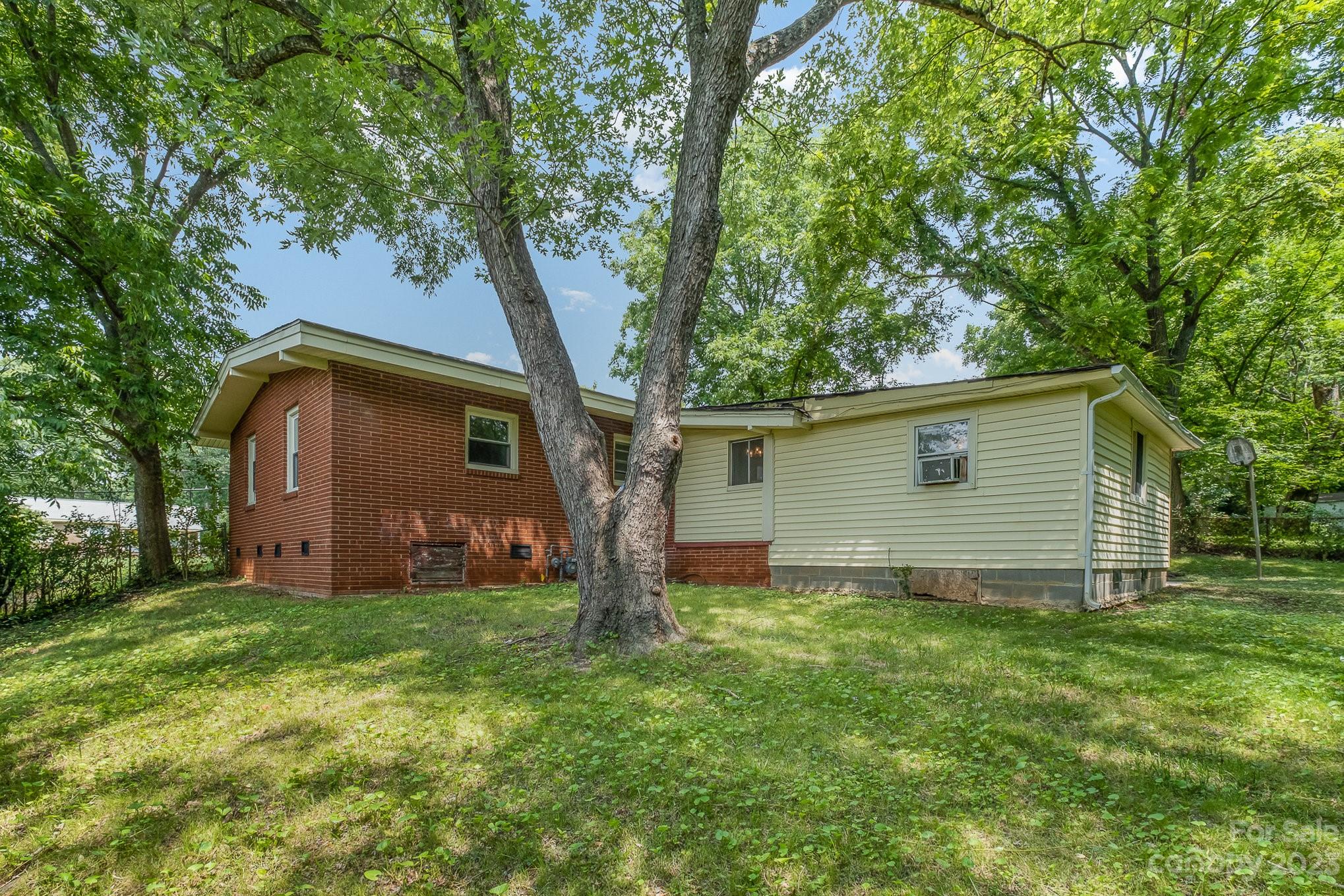 1139 Clanton Road Charlotte, NC 28217 - Photo 21 of 22 a view of a house with a yard