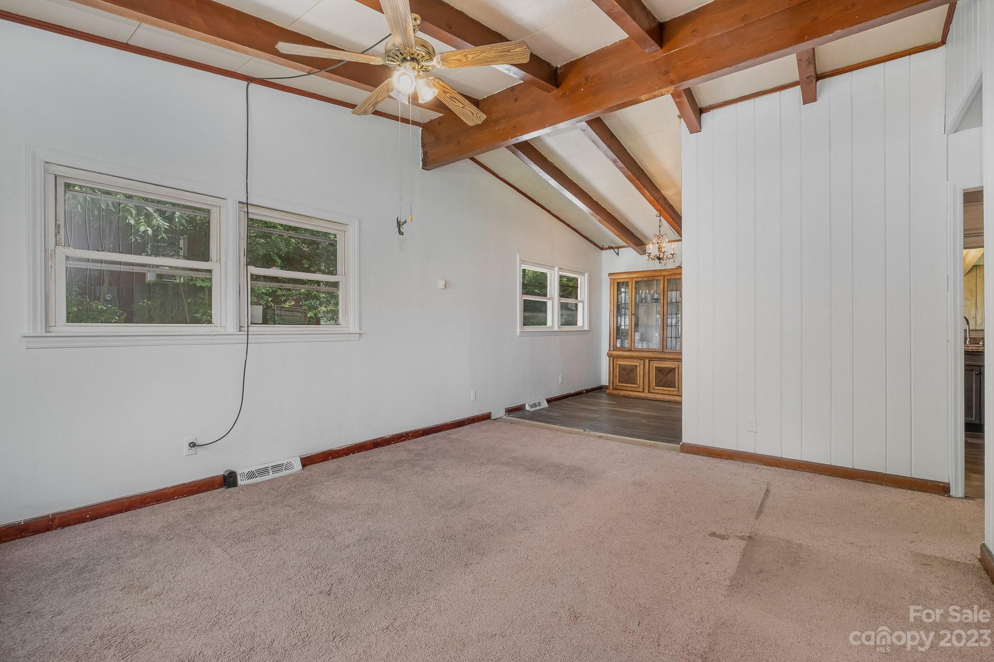1139 Clanton Road Charlotte, NC 28217 - Photo 3 of 22 a view of an empty room with a window