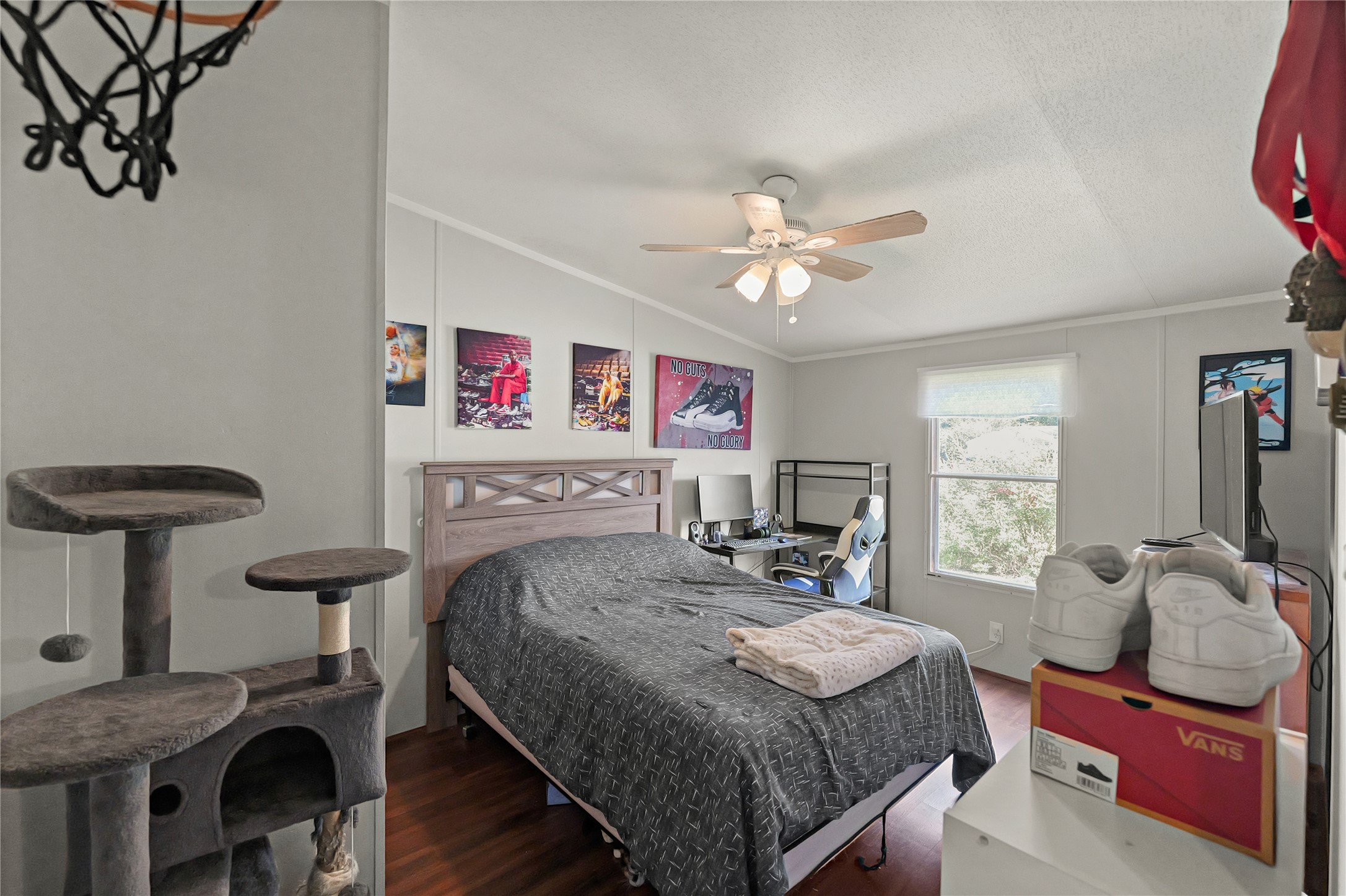 16572 River Ranch Drive Conroe, TX 77302 - Photo 12 of 24 a bedroom with a bed and furniture