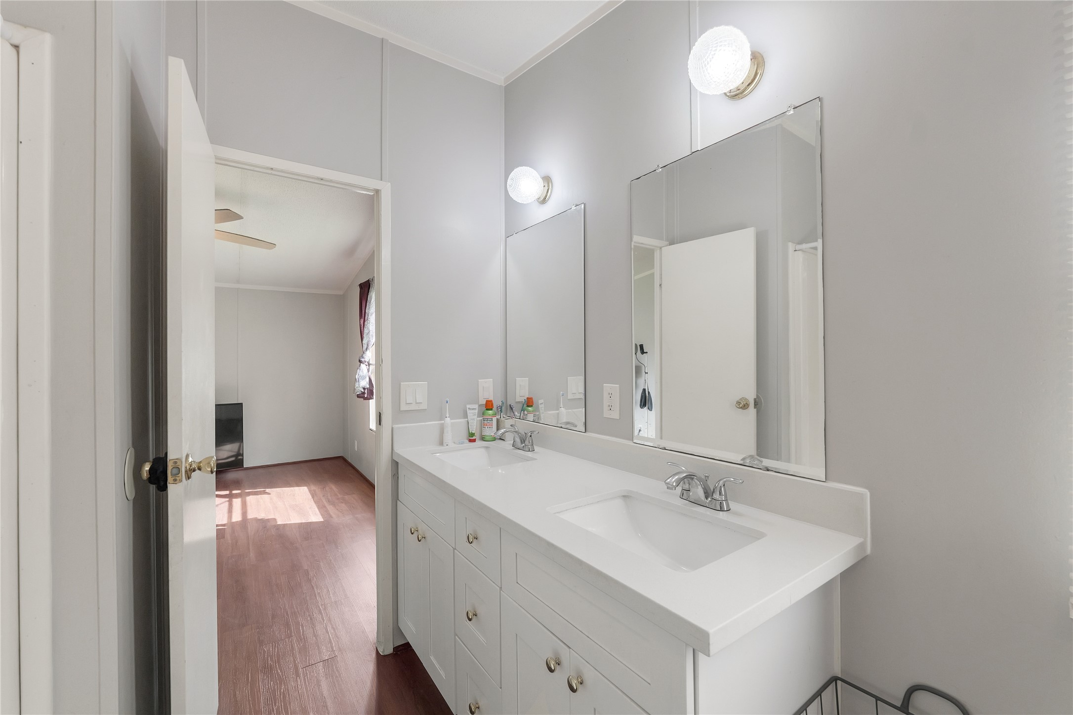 16572 River Ranch Drive Conroe, TX 77302 - Photo 17 of 24 a bathroom with a double vanity sink mirror and double