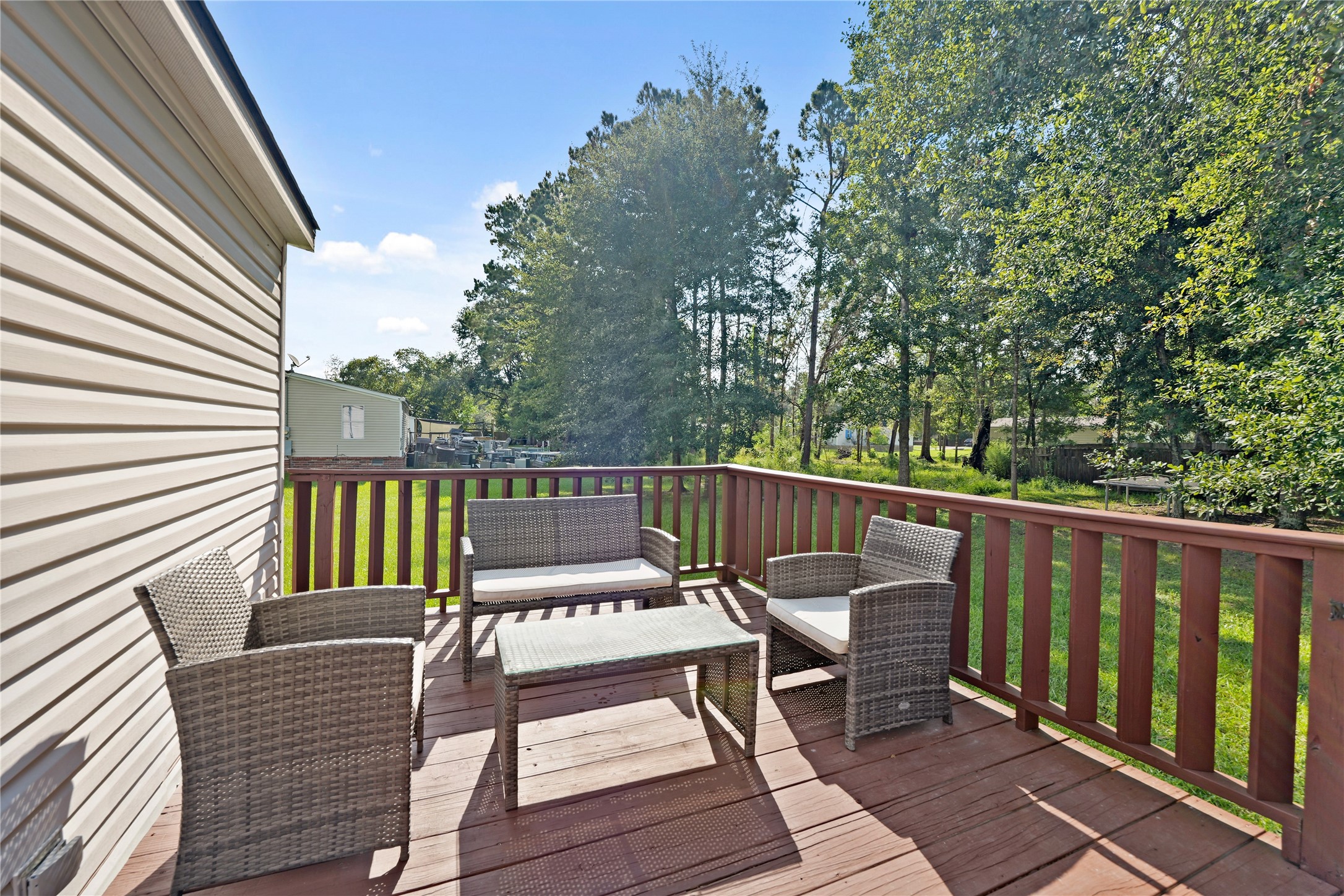 16572 River Ranch Drive Conroe, TX 77302 - Photo 18 of 24 a view of a wooden deck with furniture