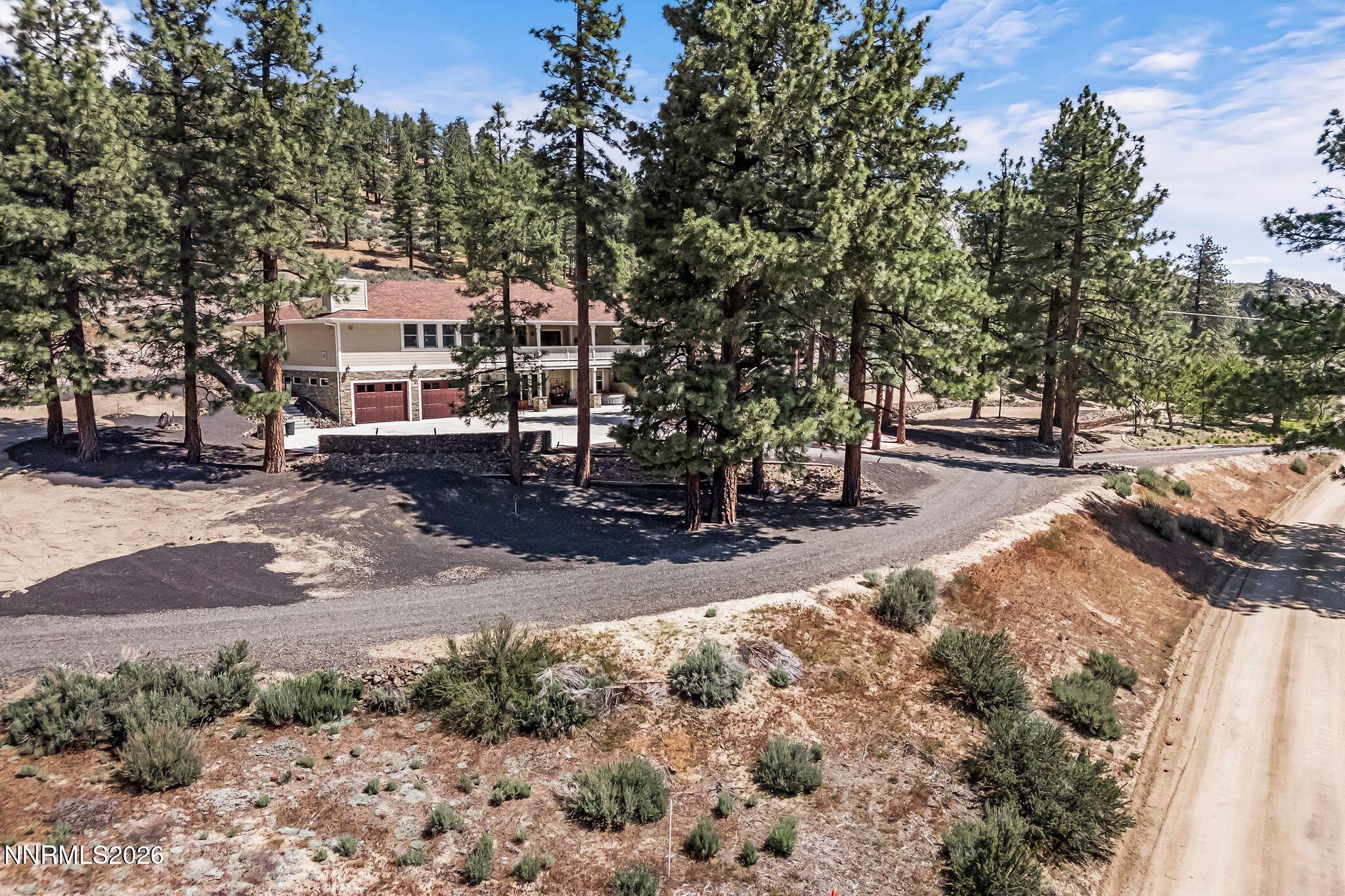 250 Jacks Valley Ranch Road Carson City, NV 89705 - Photo 40 of 44 a view of a town with large trees