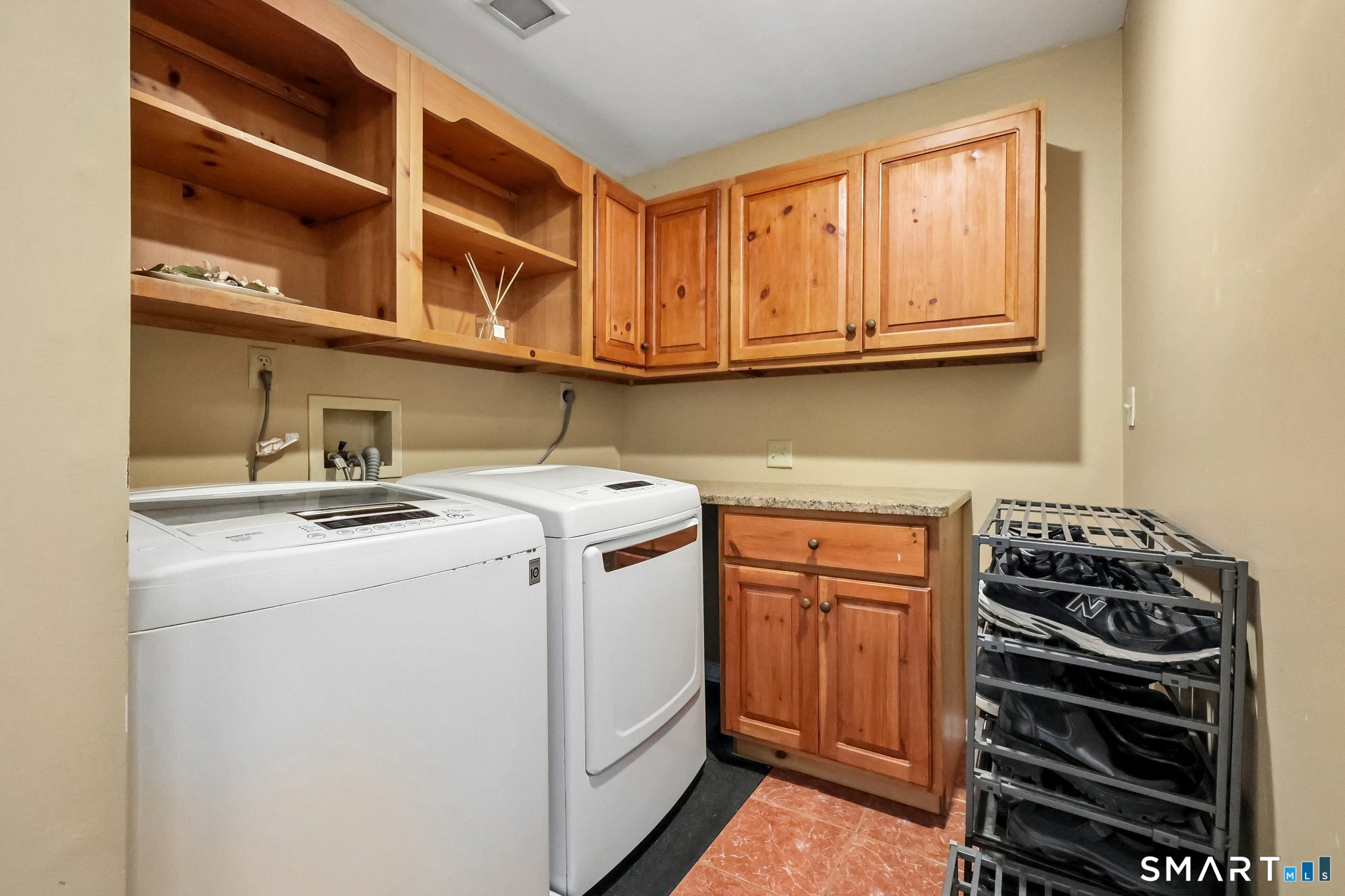 86 Quail Run Madison, CT 06443 - Photo 17 of 37 The laundry room is located on the main floor near the garage entry to the home