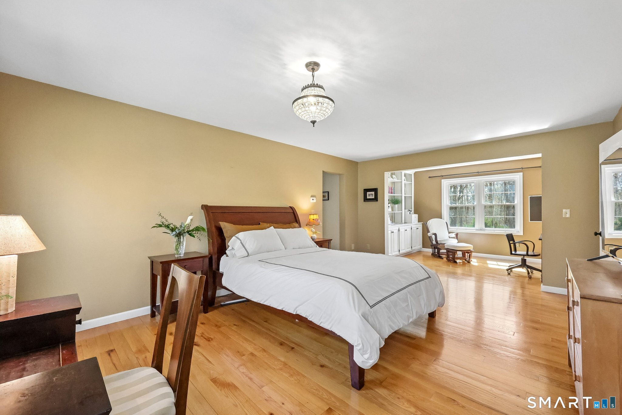 86 Quail Run Madison, CT 06443 - Photo 18 of 37 The primary bedroom is a joy! There's a separate space for an office, nursery or sitting room