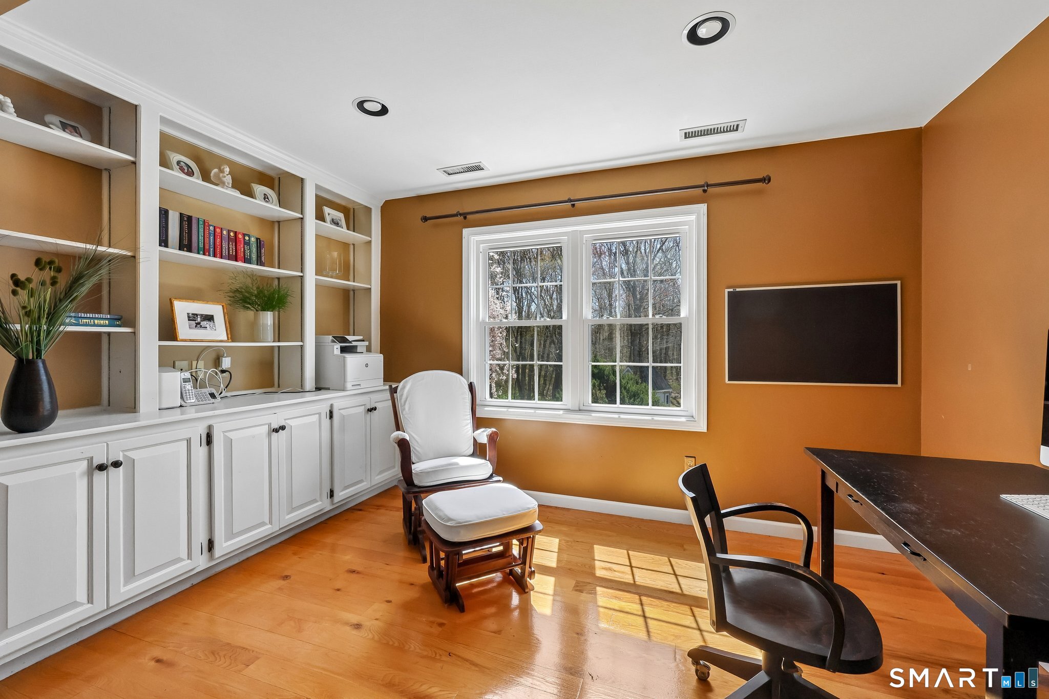 86 Quail Run Madison, CT 06443 - Photo 20 of 37 The primary sitting room/office has built-in cabinets and bookshelves