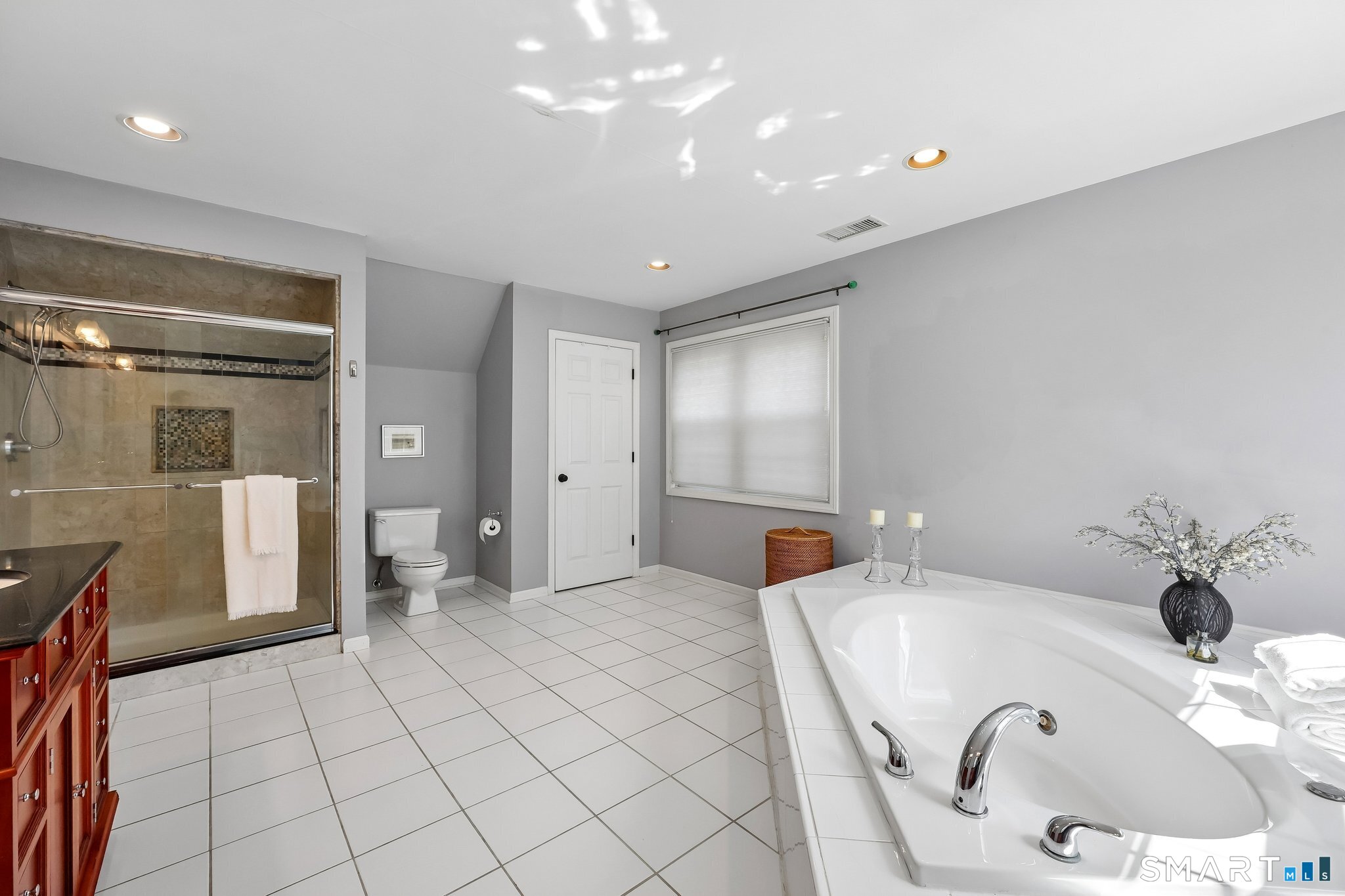 86 Quail Run Madison, CT 06443 - Photo 22 of 37 Notice the large tiled shower and jetted tub