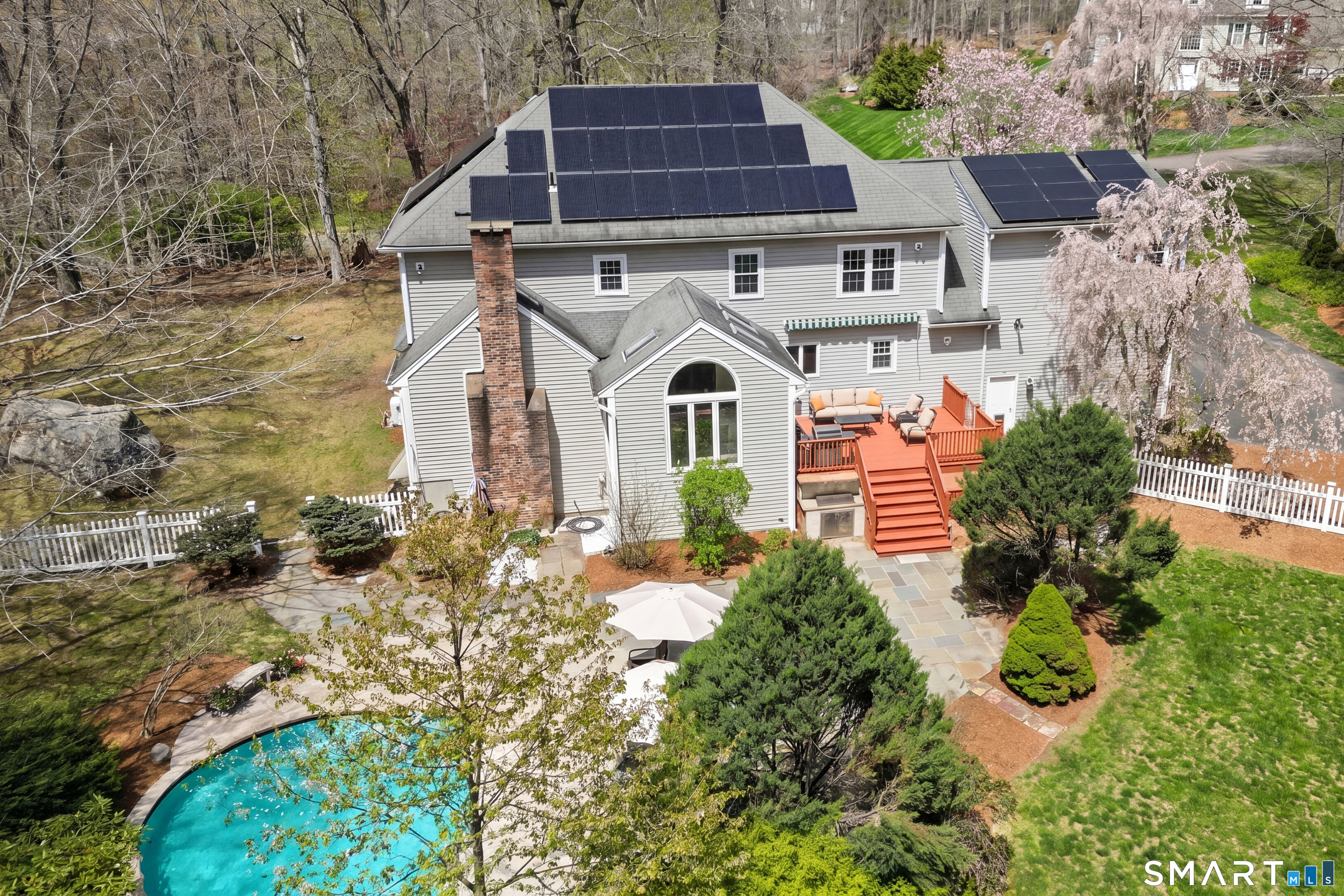 86 Quail Run Madison, CT 06443 - Photo 31 of 37 Notice the solar panels on the back of the home