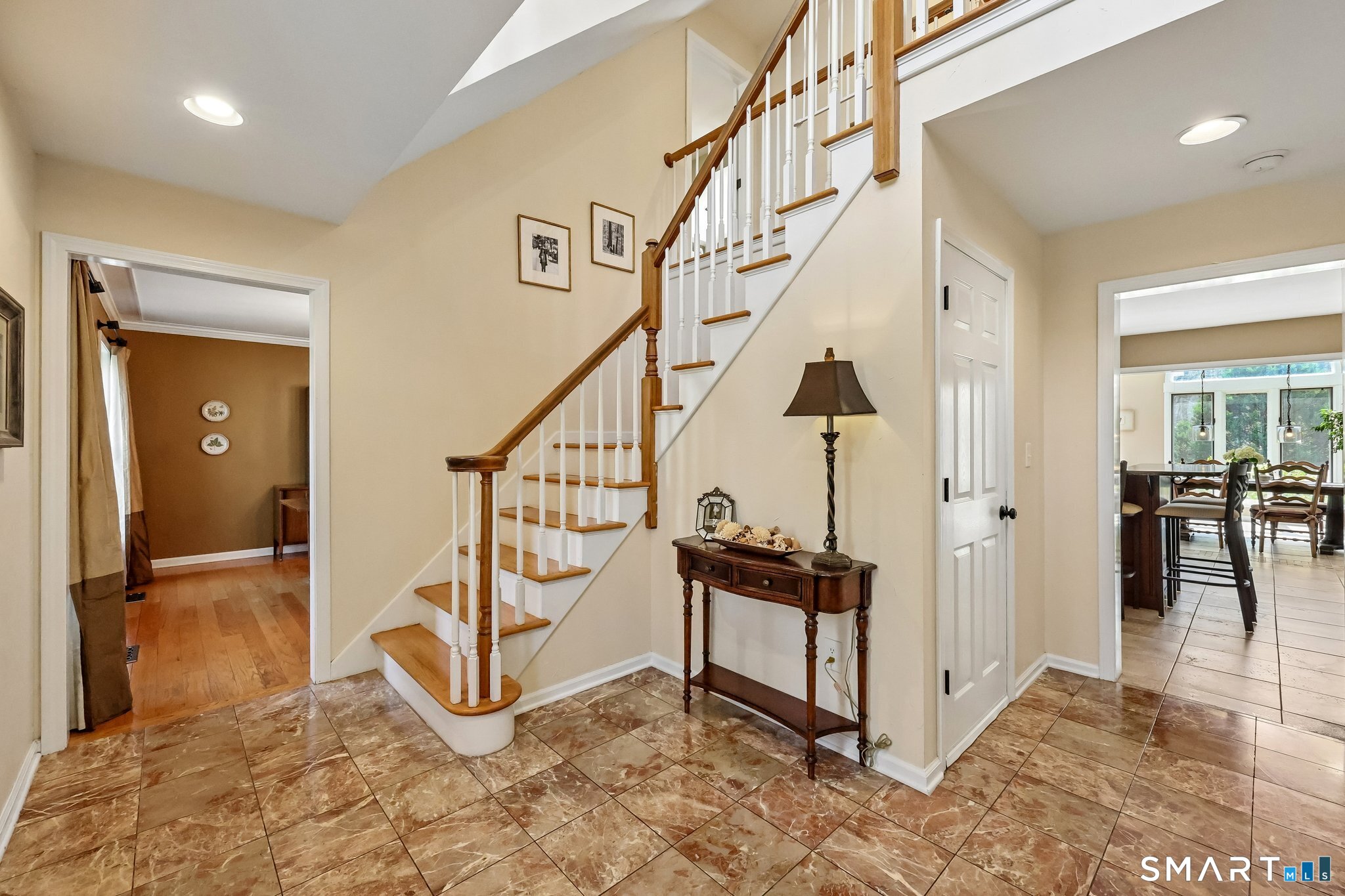 86 Quail Run Madison, CT 06443 - Photo 6 of 37 The two story foyer with marble floor tile