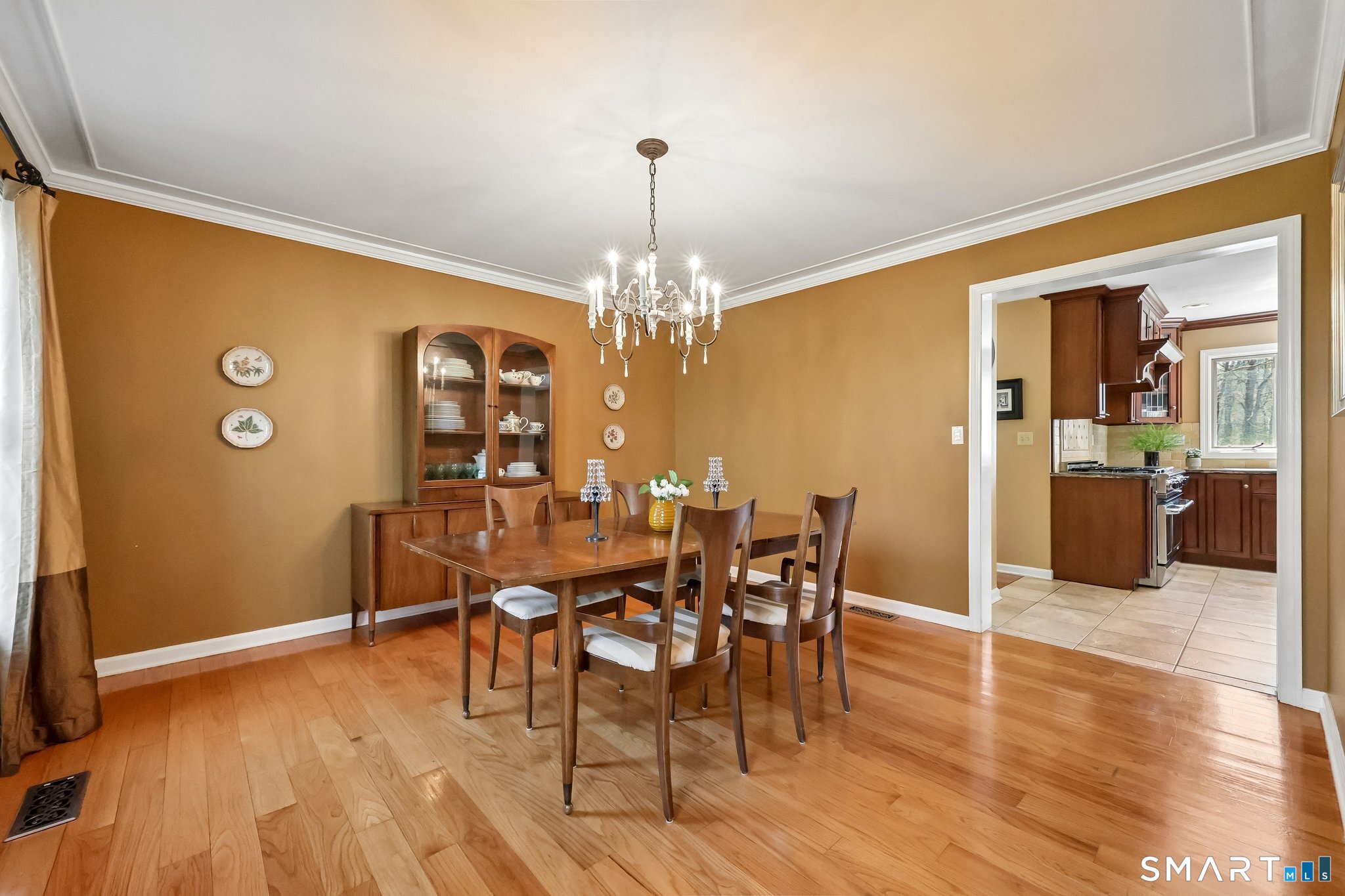 86 Quail Run Madison, CT 06443 - Photo 7 of 37 The formal dining room. Notice the crown molding and molding on the ceiling