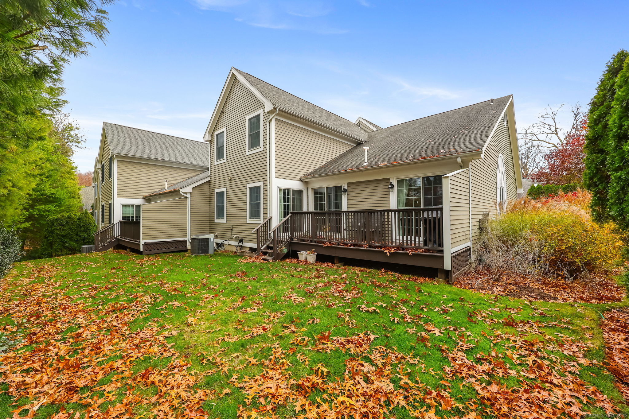 76 Hilary Circle, Unit 76 Fairfield, CT 06825 - Photo 25 of 29 a view of a house with backyard