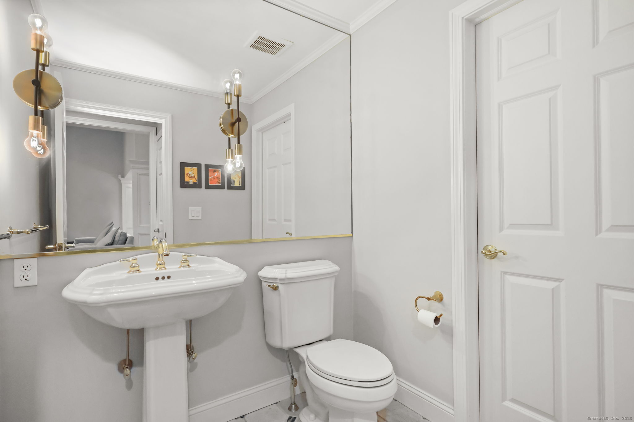 76 Hilary Circle, Unit 76 Fairfield, CT 06825 - Photo 9 of 29 a bathroom with a sink toilet and a mirror