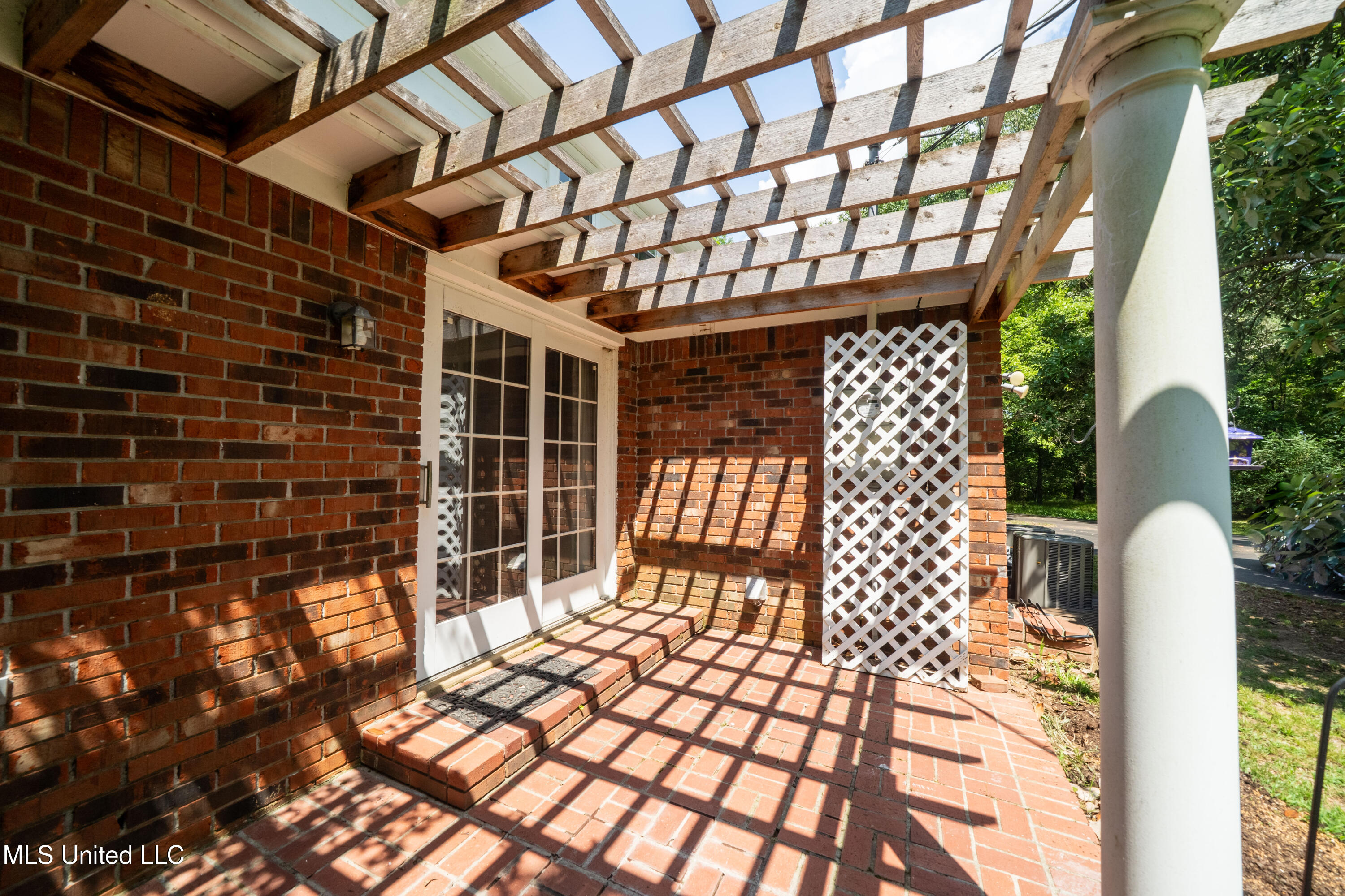 6333 Church Road Walls, MS 38680 - Photo 37 of 44 Pergola-covered back porch
