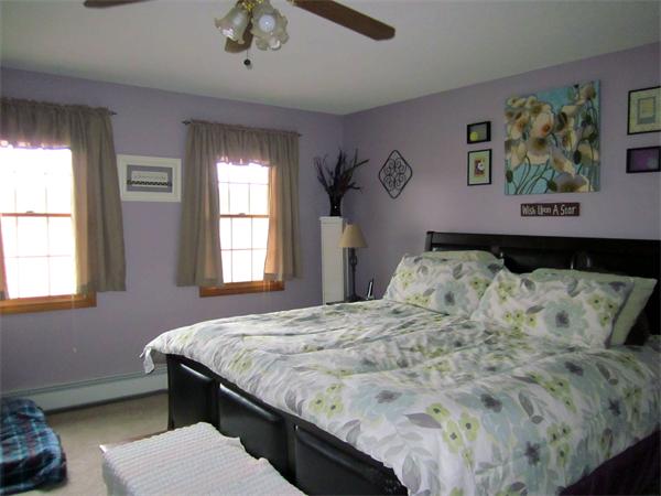 36 Strong Road Southampton, MA 01073 - Photo 14 of 20 a bedroom with bed and painting on the wall