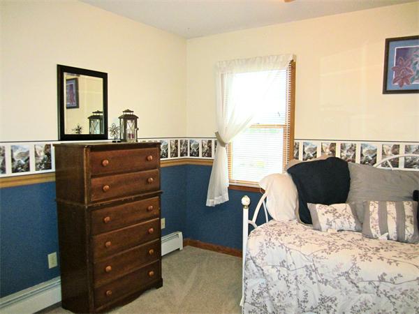 36 Strong Road Southampton, MA 01073 - Photo 16 of 20 a bed room with a bed and a dresser