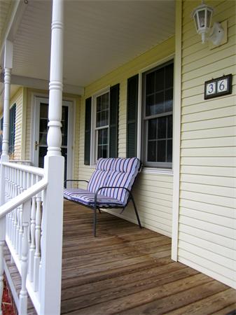 36 Strong Road Southampton, MA 01073 - Photo 3 of 20 a view of a wooden chairs on the deck