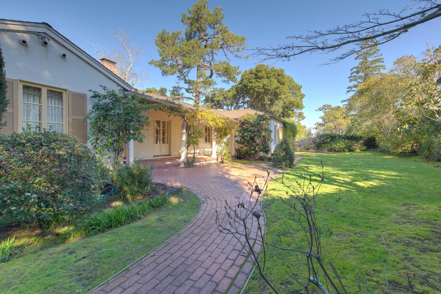 540 Roehampton Road Hillsborough, CA 94010 - Photo 1 of 27 a view of a yard of the house