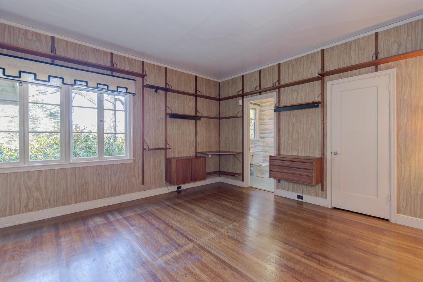 540 Roehampton Road Hillsborough, CA 94010 - Photo 15 of 27 a view of empty room with wooden floor and fan