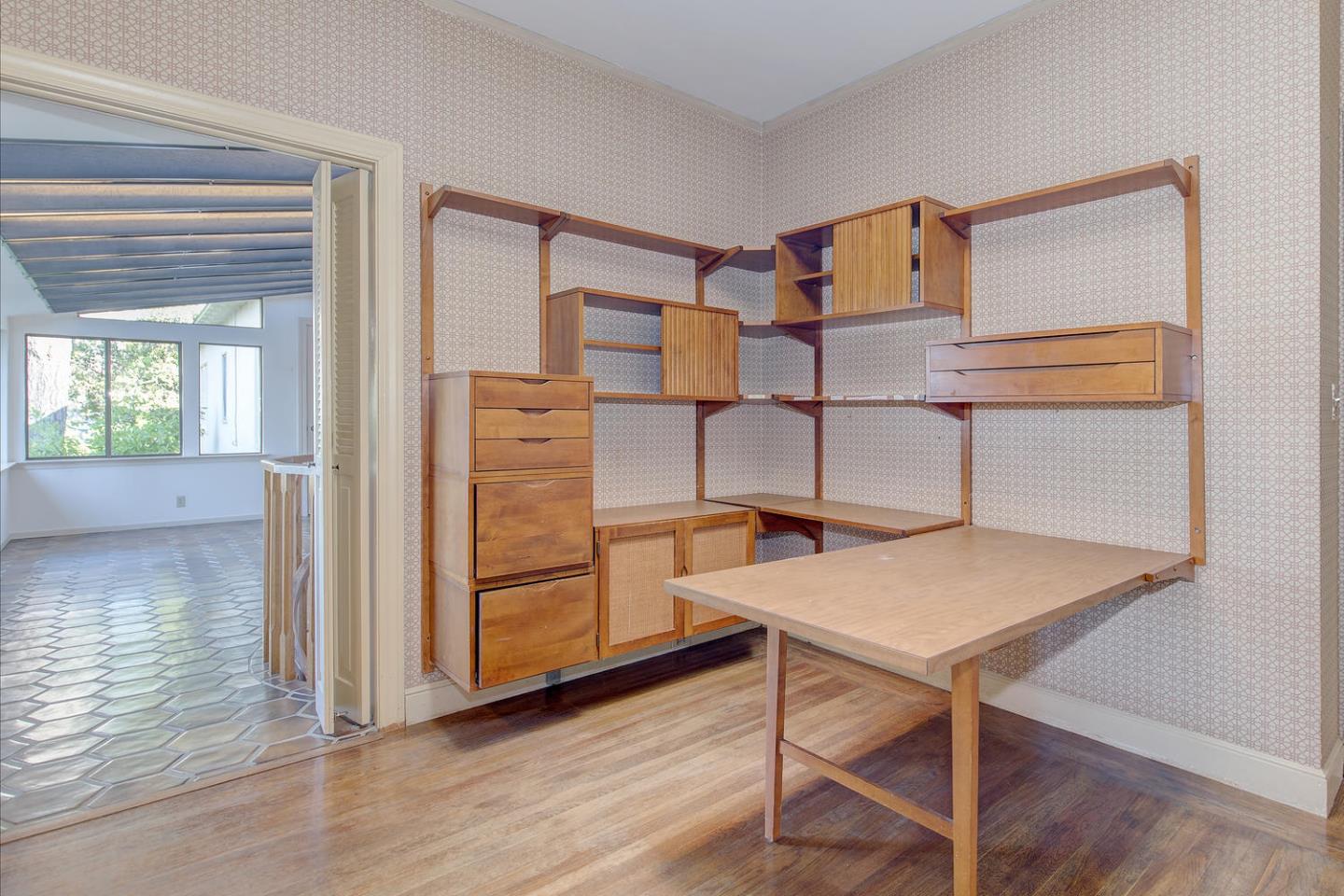 540 Roehampton Road Hillsborough, CA 94010 - Photo 16 of 27 a view of a bedroom with furniture and wooden floor