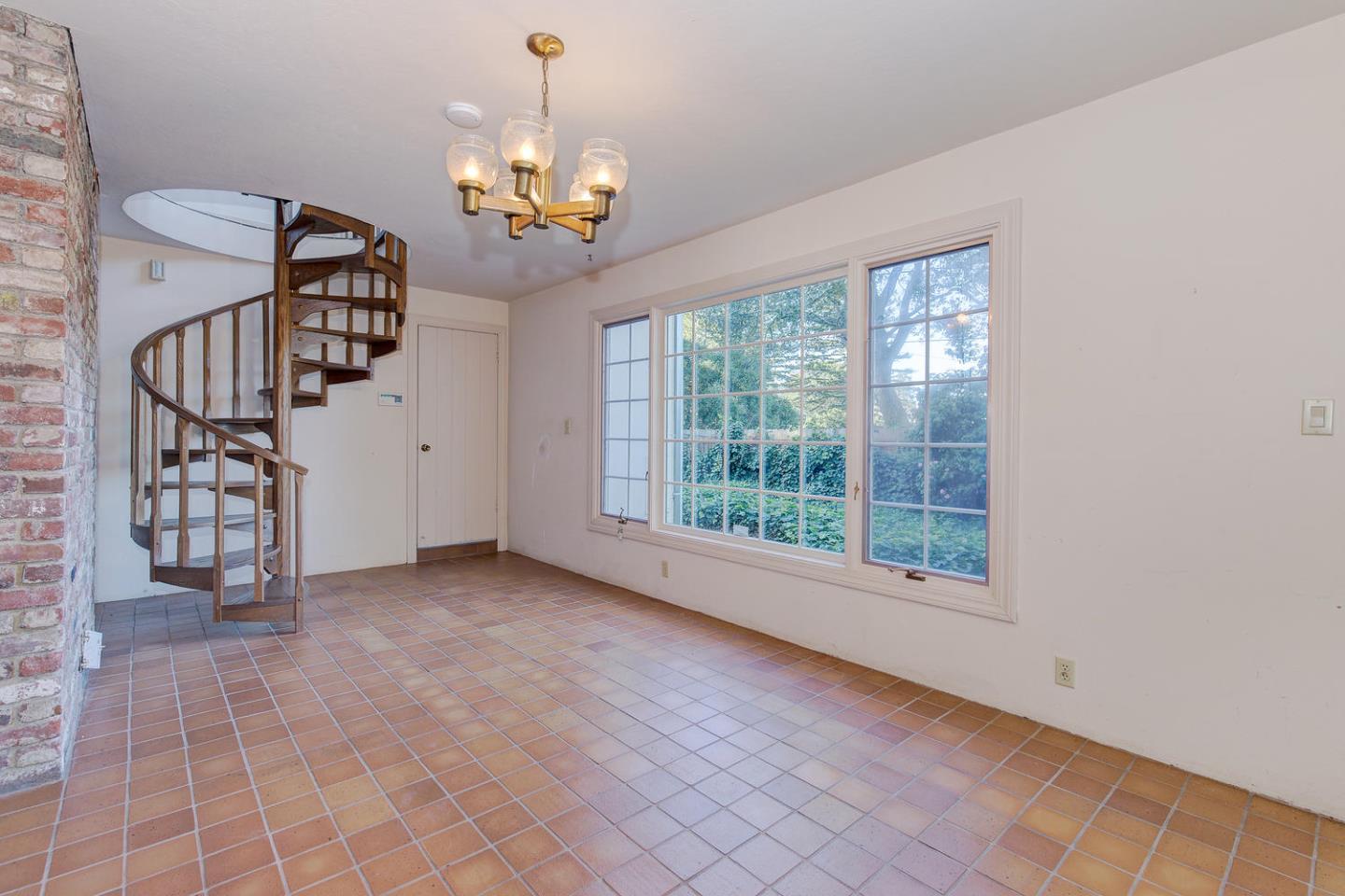 540 Roehampton Road Hillsborough, CA 94010 - Photo 20 of 27 a view of an empty room with a window