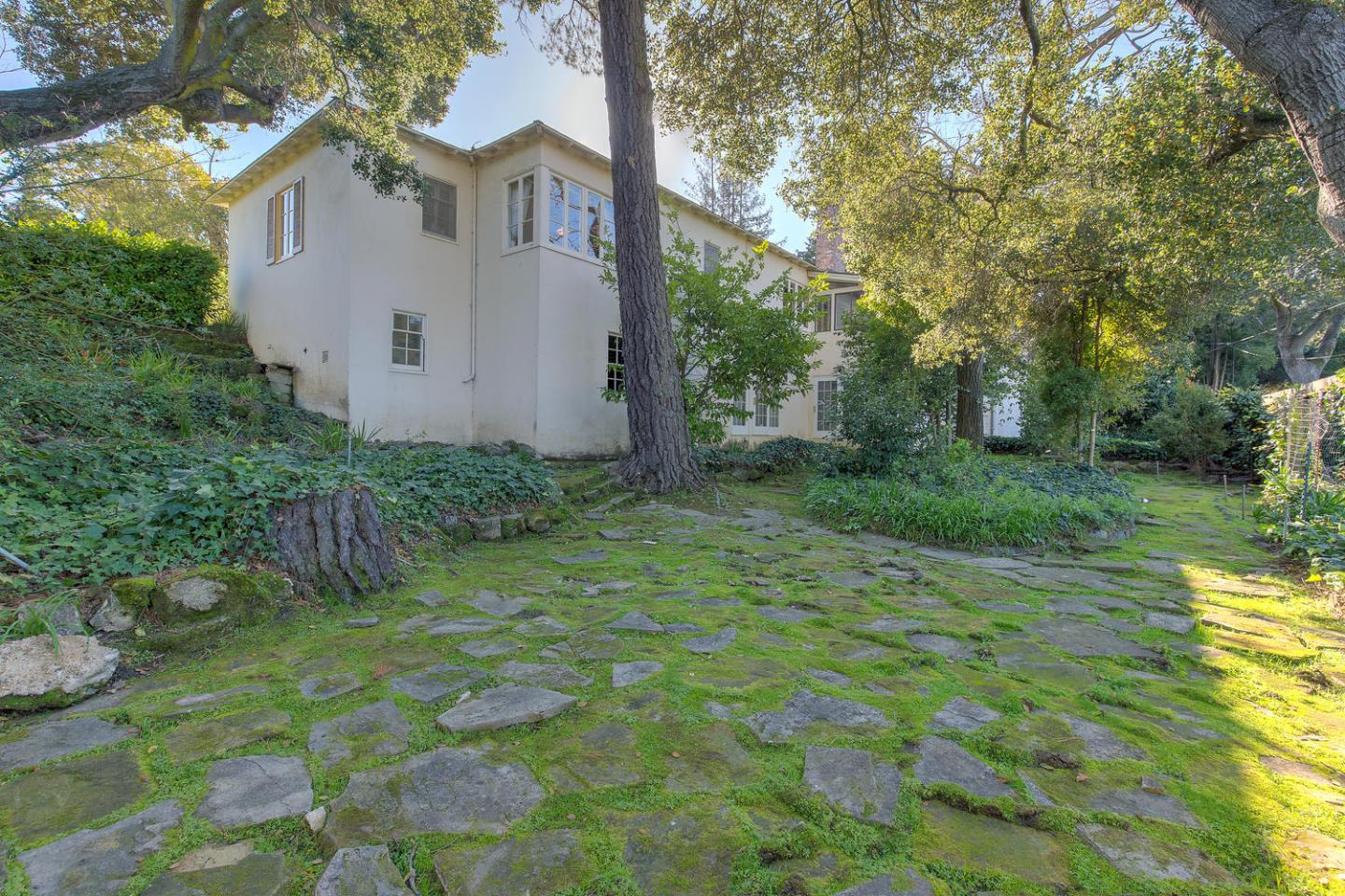 540 Roehampton Road Hillsborough, CA 94010 - Photo 24 of 27 a view of a house with a yard