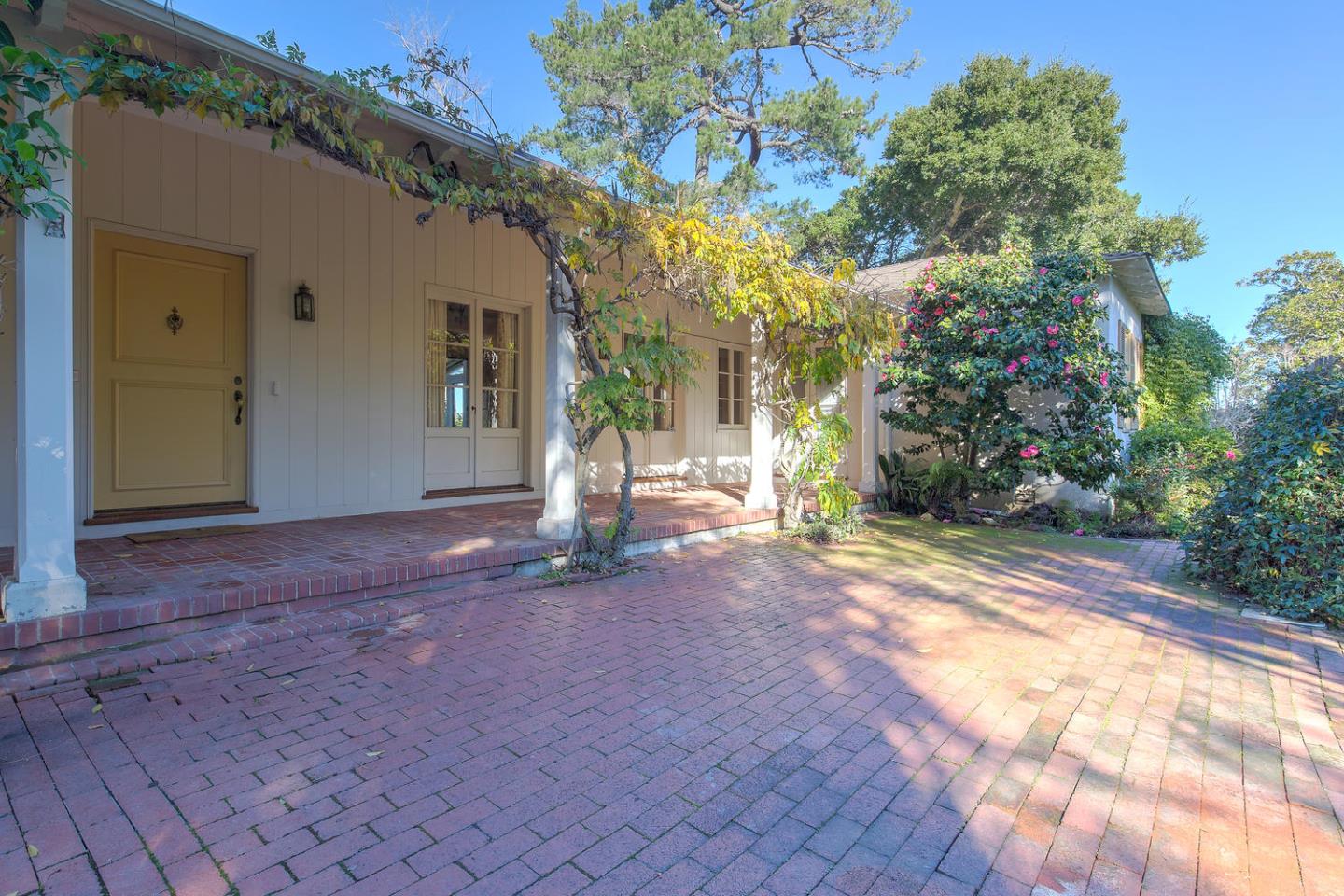 540 Roehampton Road Hillsborough, CA 94010 - Photo 3 of 27 a view of a house with backyard and tree