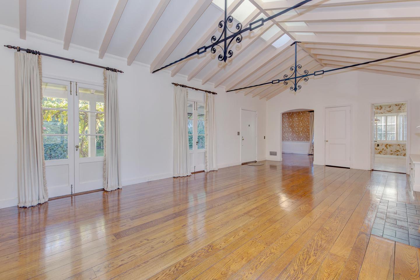 540 Roehampton Road Hillsborough, CA 94010 - Photo 5 of 27 a view of a livingroom with wooden floor