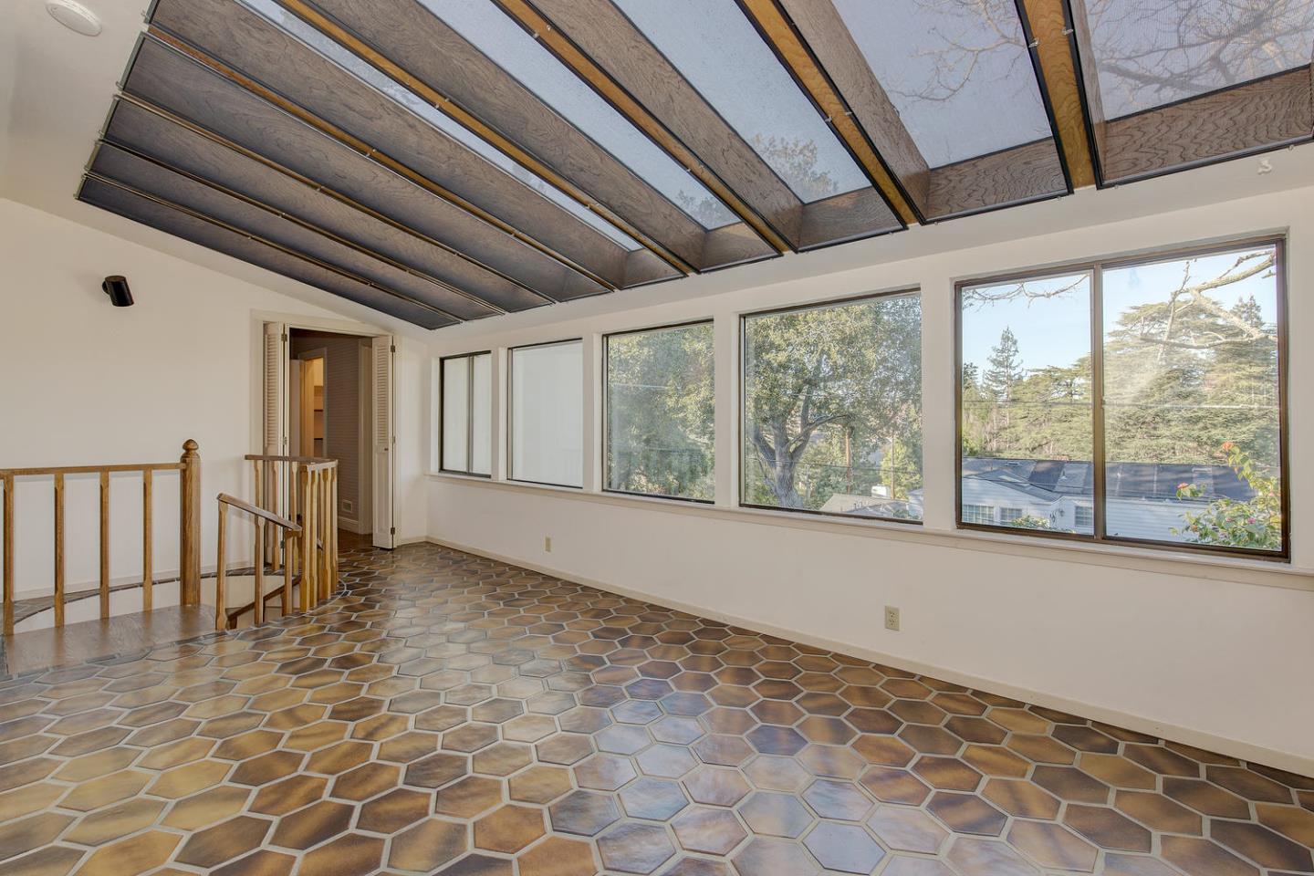 540 Roehampton Road Hillsborough, CA 94010 - Photo 6 of 27 a view of an empty room with a window